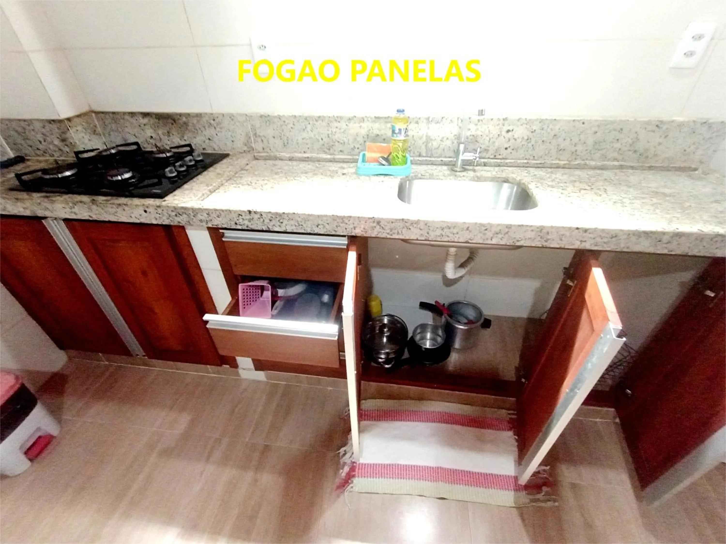 Kitchen or kitchenette in Pousada Lagoa Flat