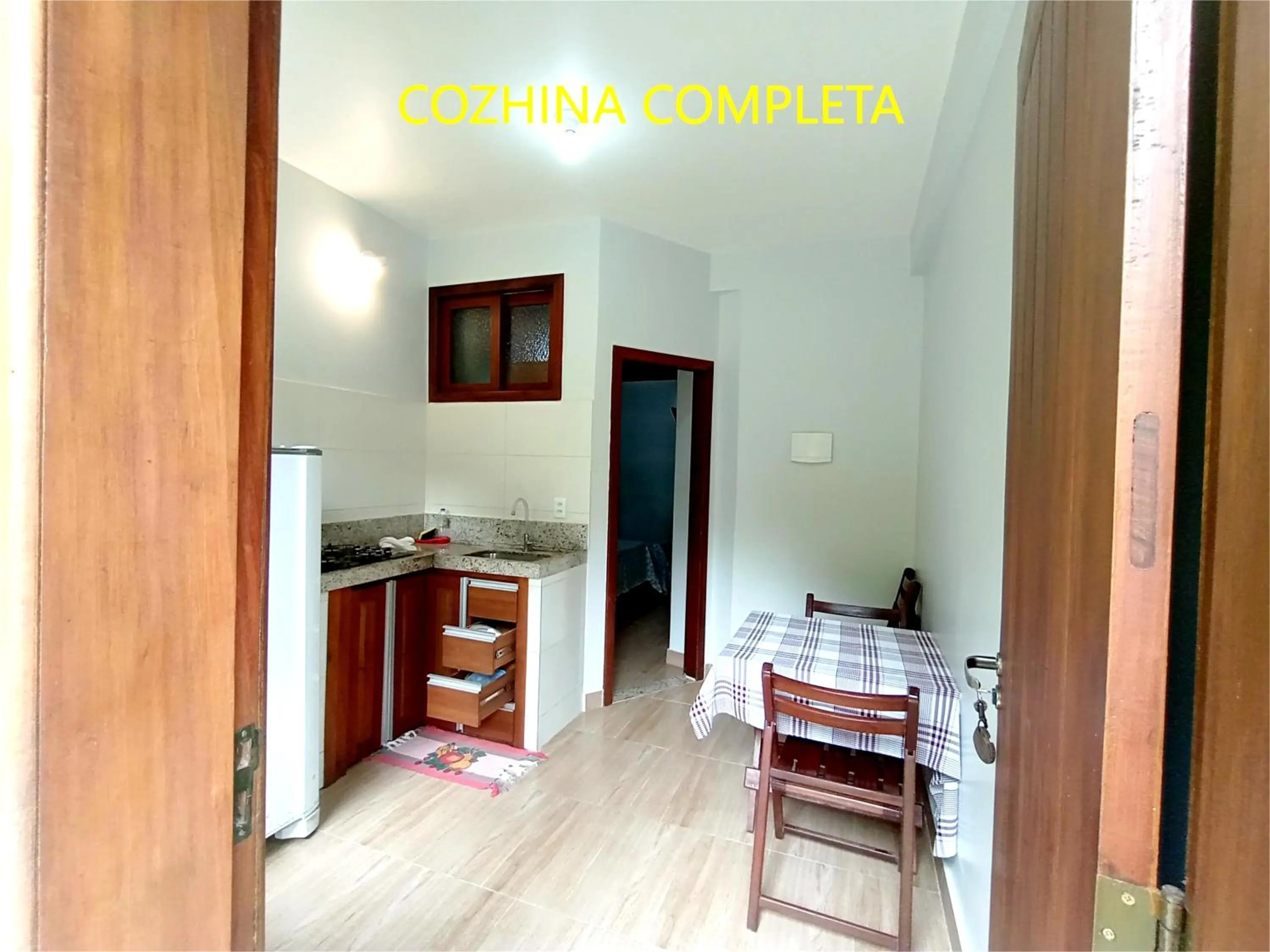 Kitchen or kitchenette, Bed in Pousada Lagoa Flat