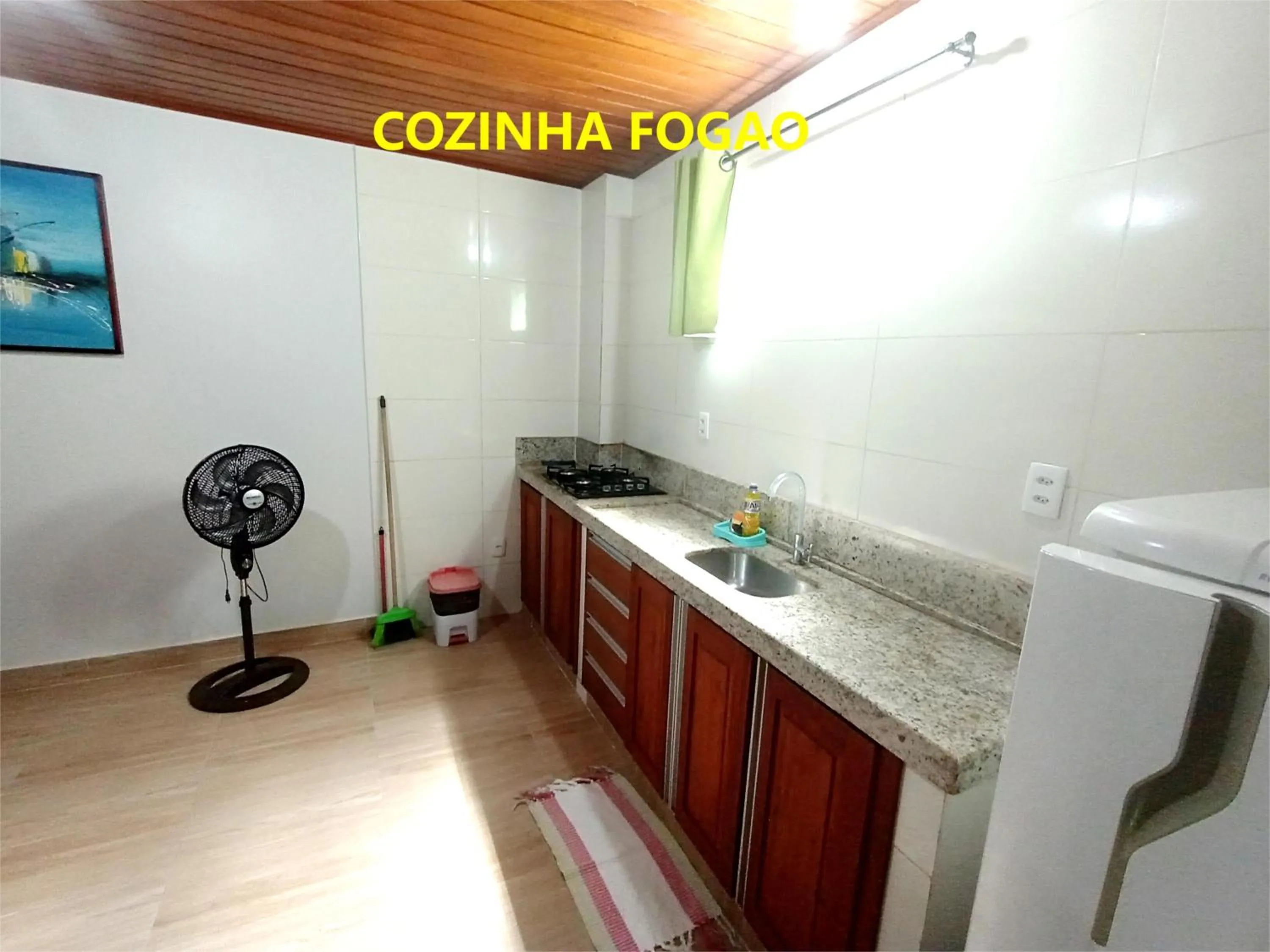 Kitchen or kitchenette in Pousada Lagoa Flat