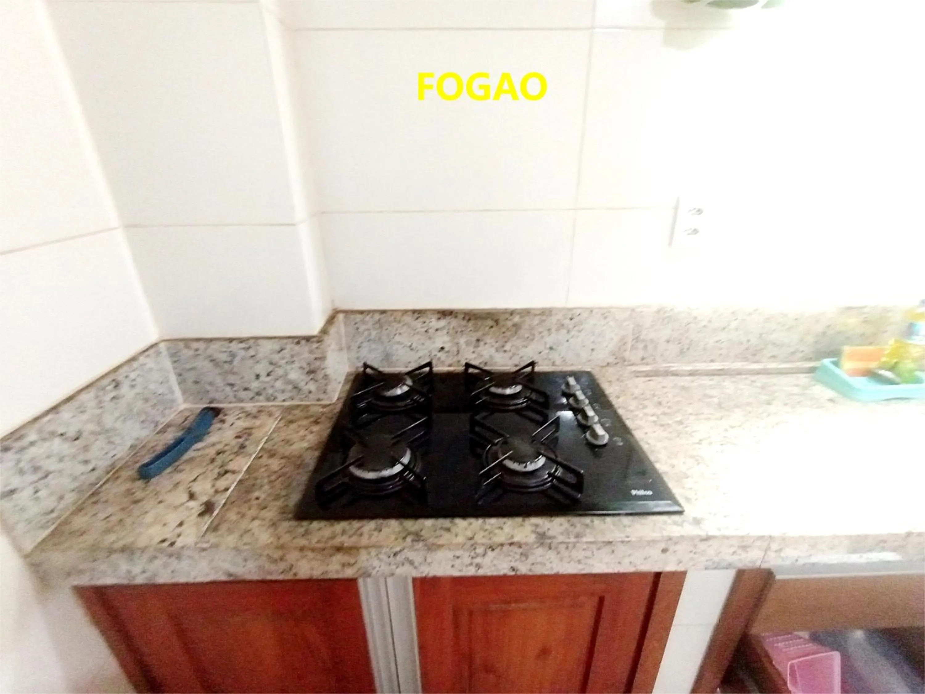 Kitchen or kitchenette in Pousada Lagoa Flat