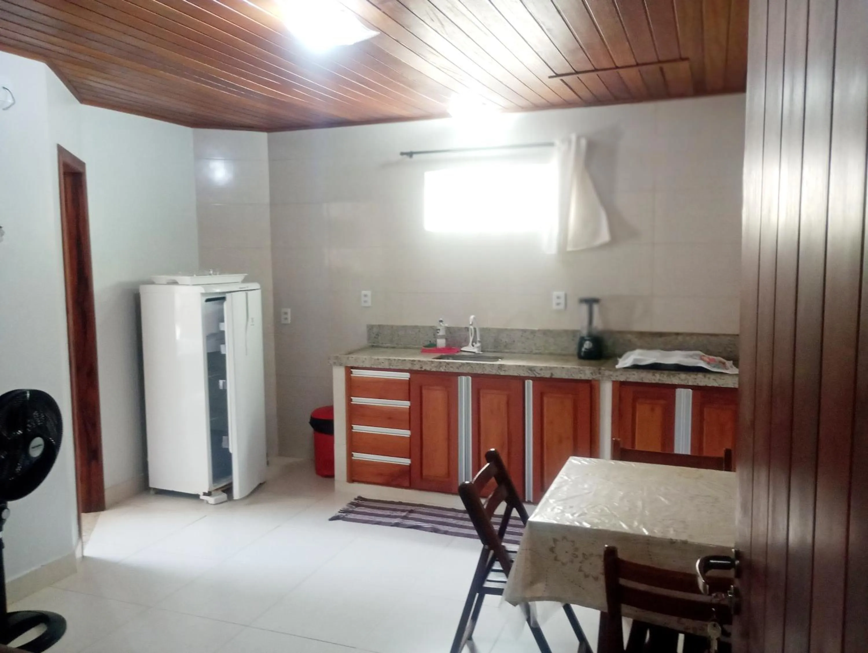 Kitchen or kitchenette in Pousada Lagoa Flat