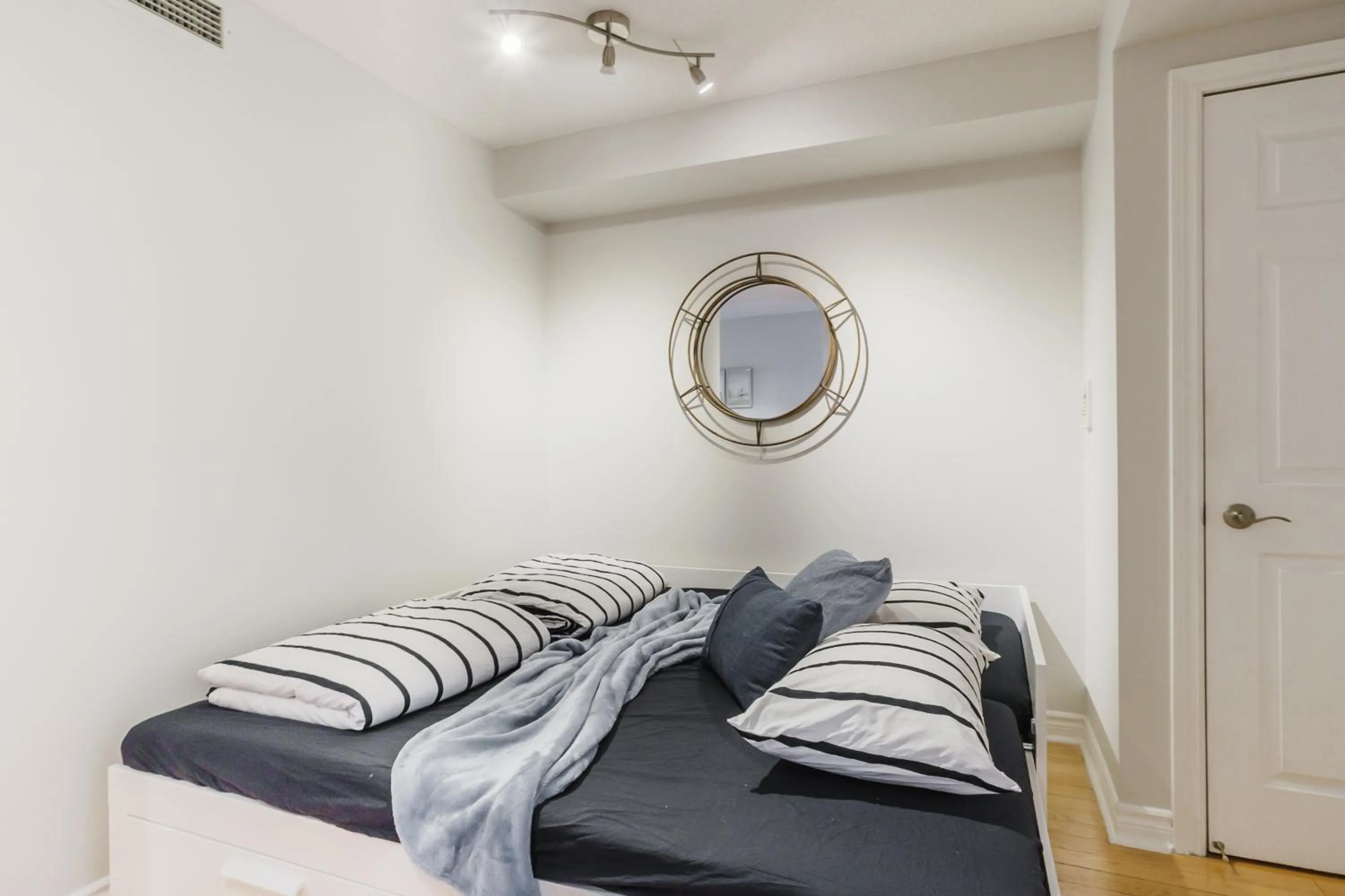 Bed in AOC Suites - Heart of Downtown Condo