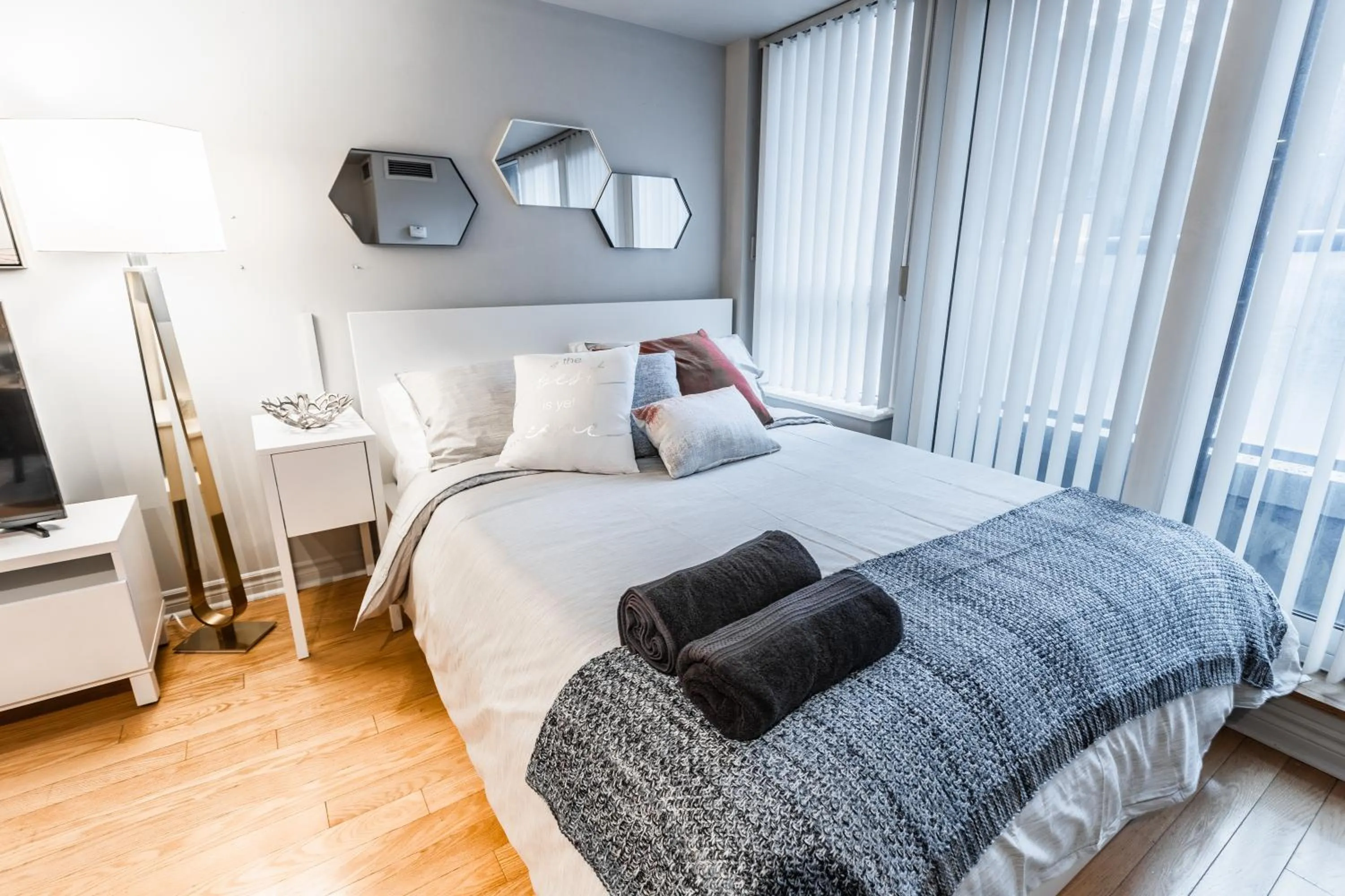 Bed in AOC Suites - Heart of Downtown Condo