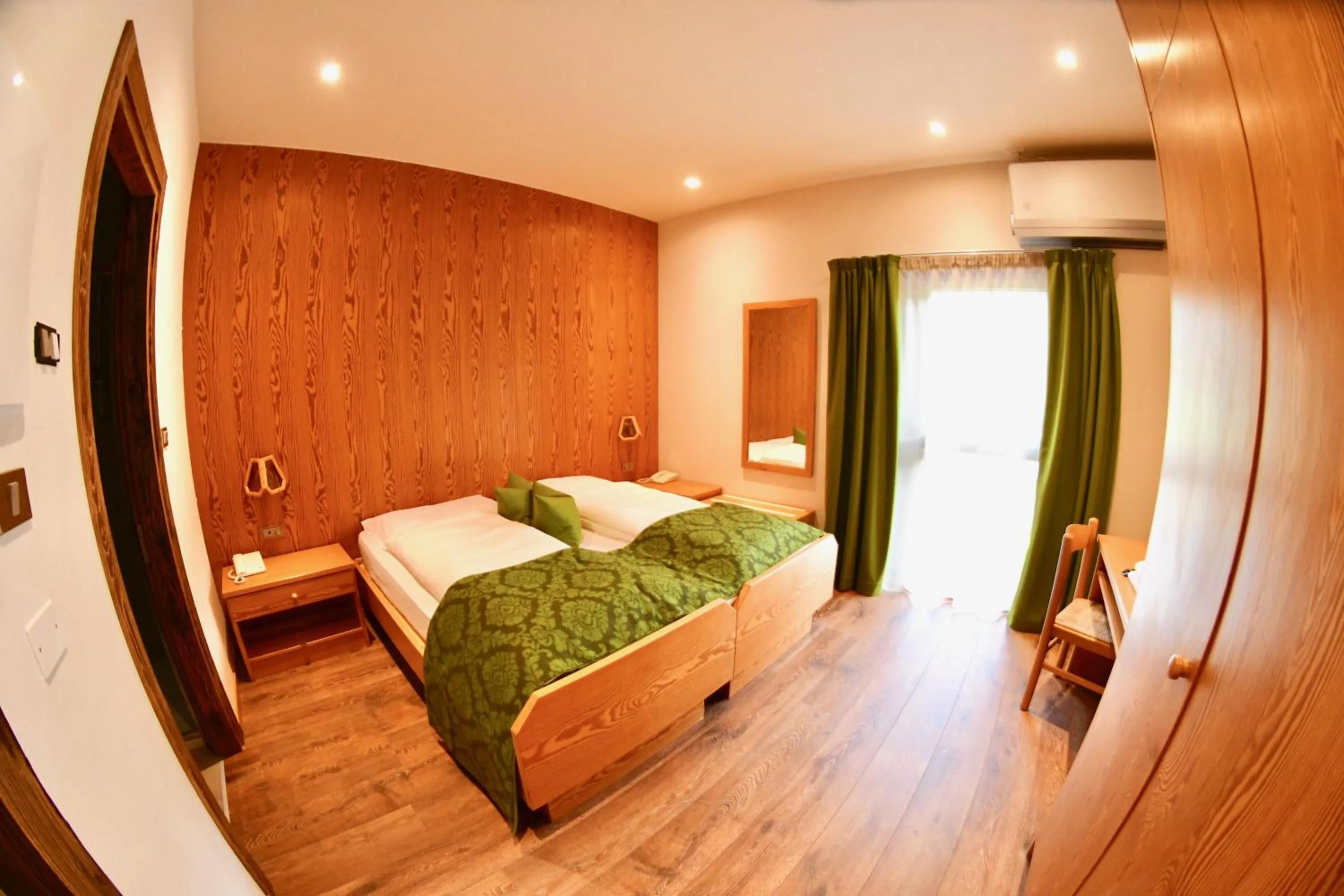 Bedroom, Bed in Hotel Alpenrose Wellness