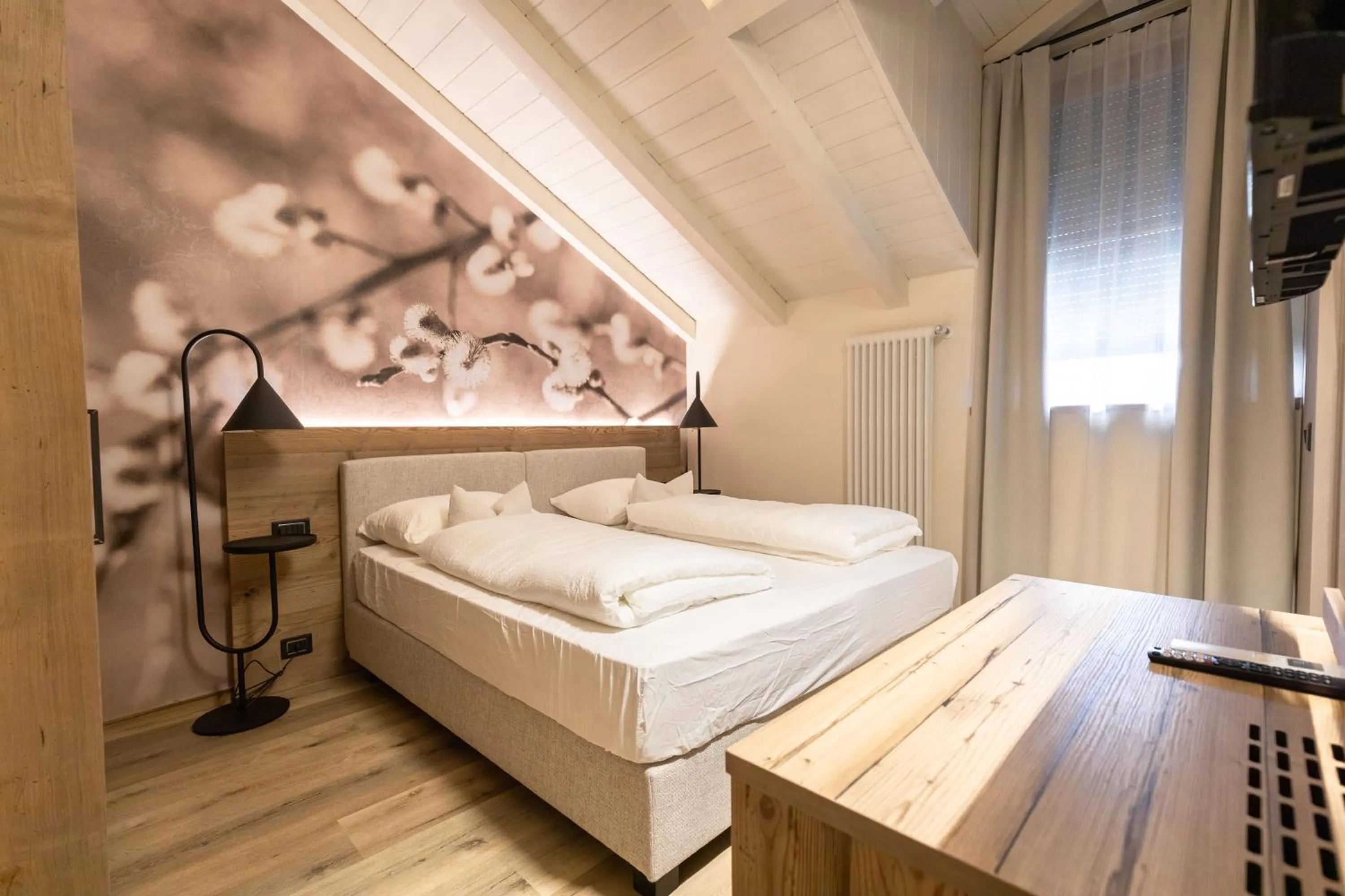 Bed in Hotel Alpenrose Wellness