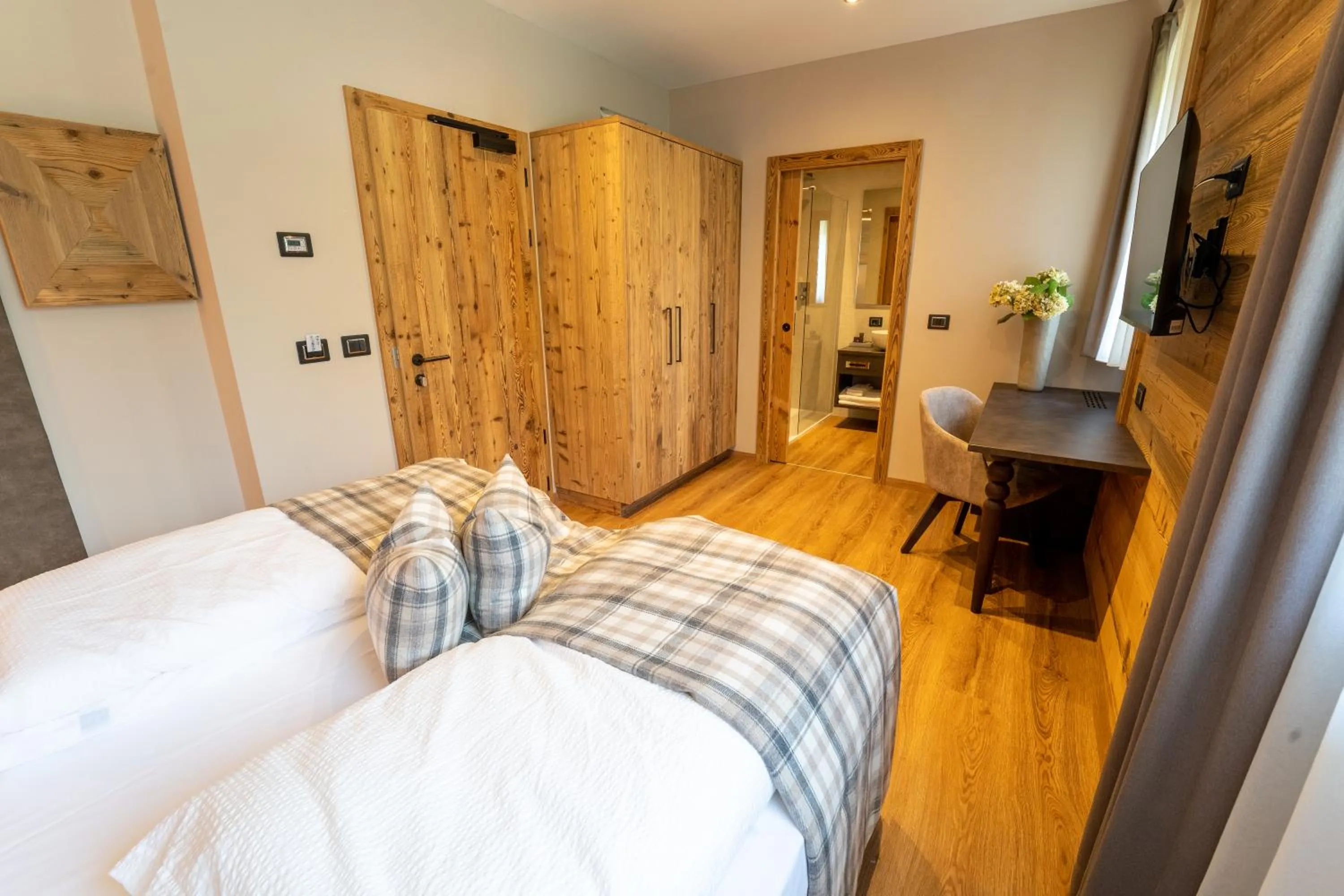 Bed in Hotel Alpenrose Wellness