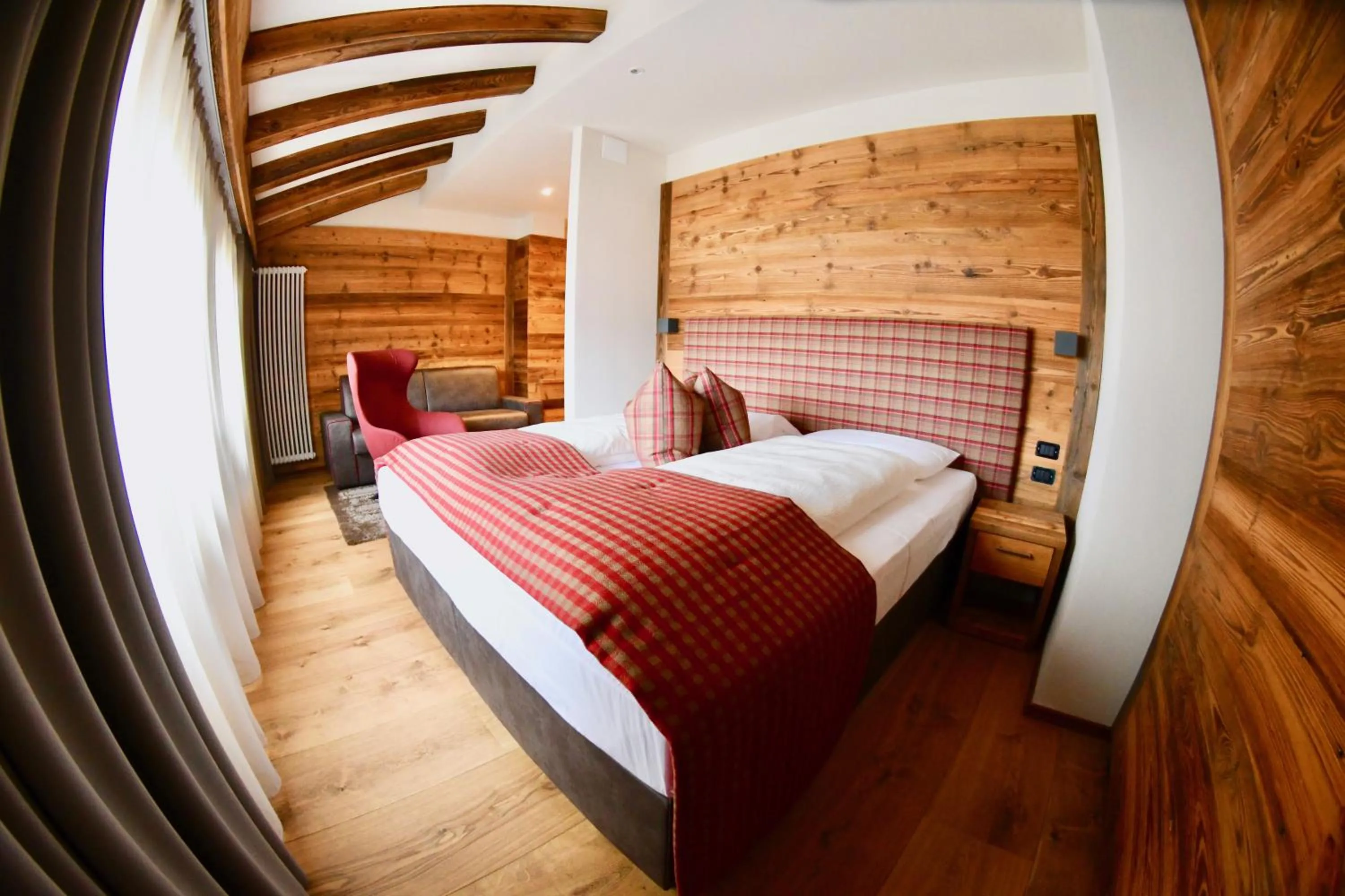 Bedroom, Bed in Hotel Alpenrose Wellness