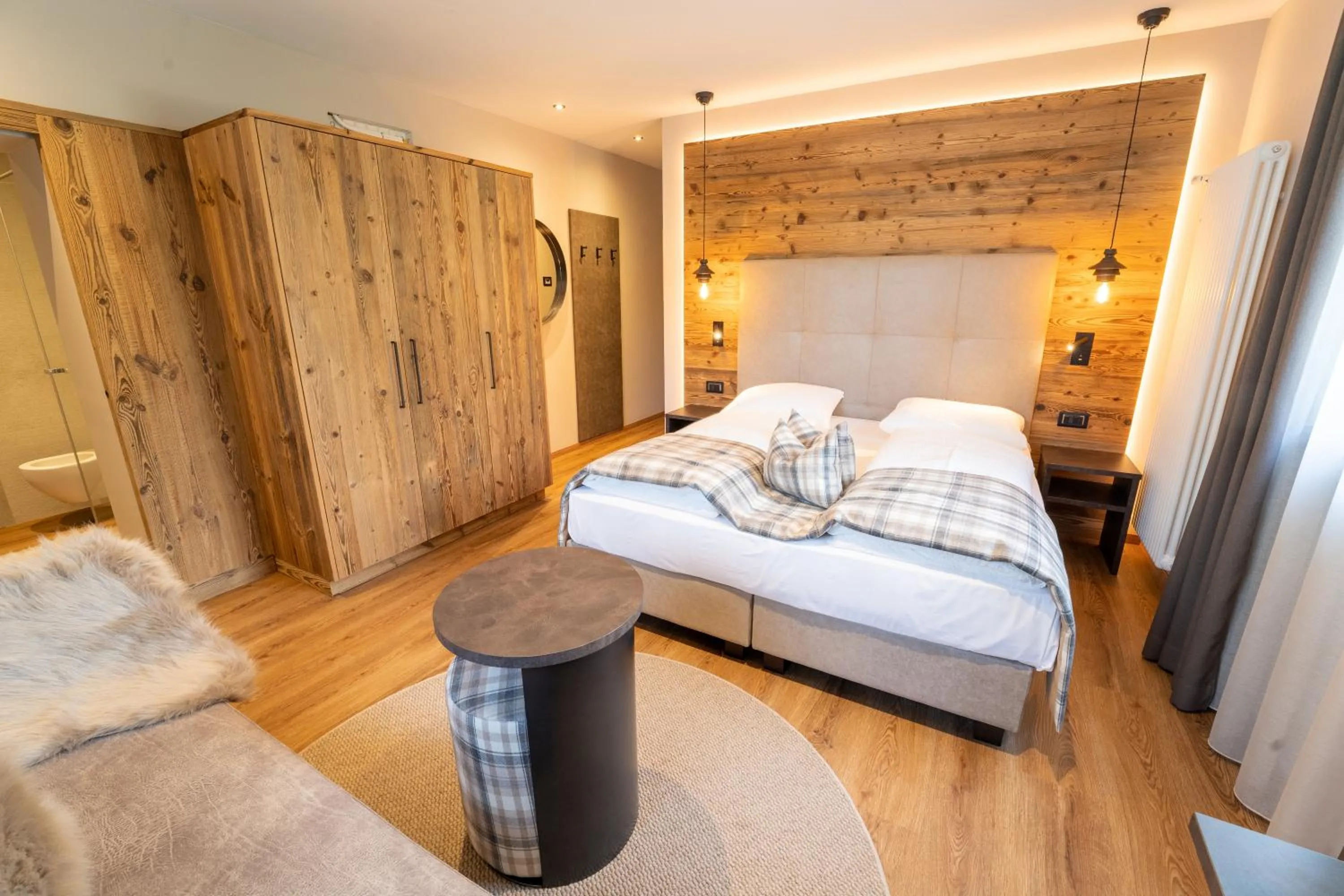 Bed in Hotel Alpenrose Wellness