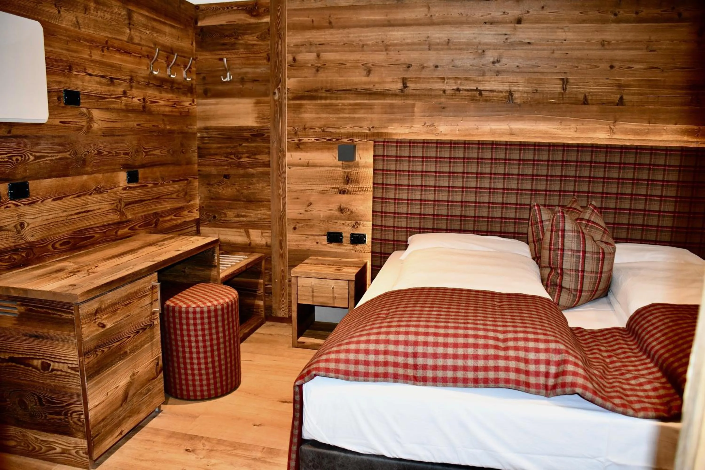 Bed in Hotel Alpenrose Wellness