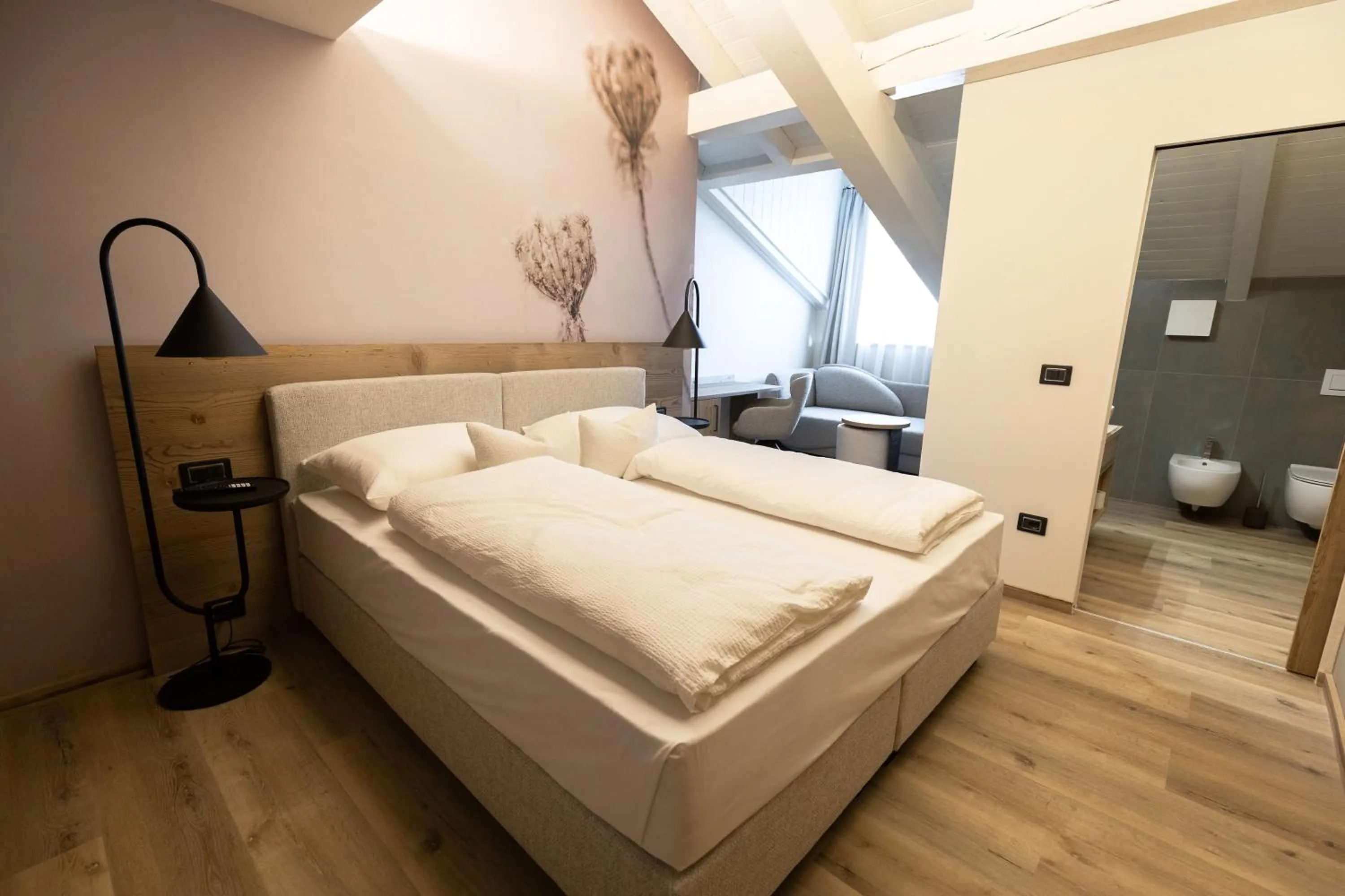 Bed in Hotel Alpenrose Wellness