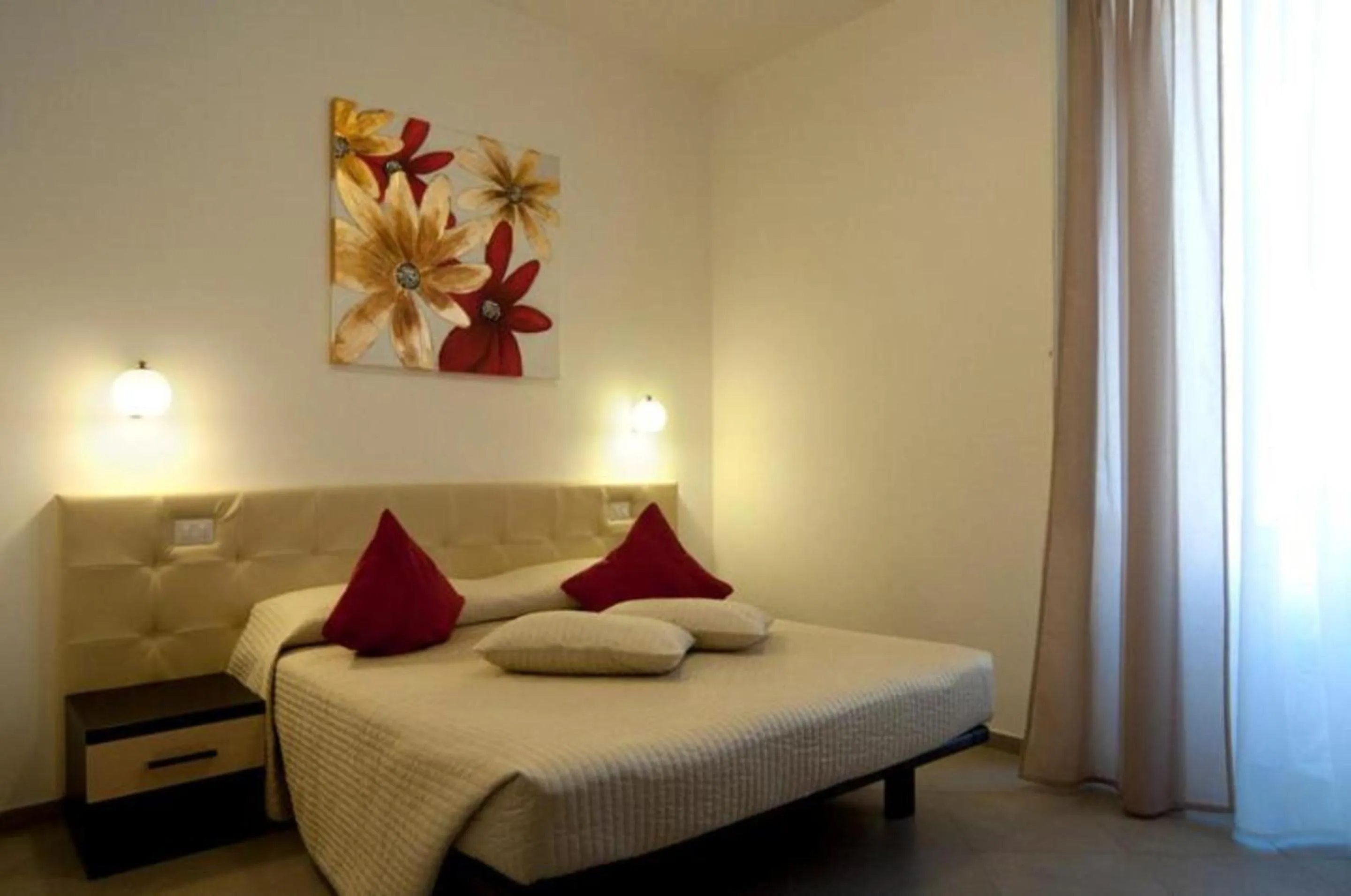 Bed in Ara Pacis Inn