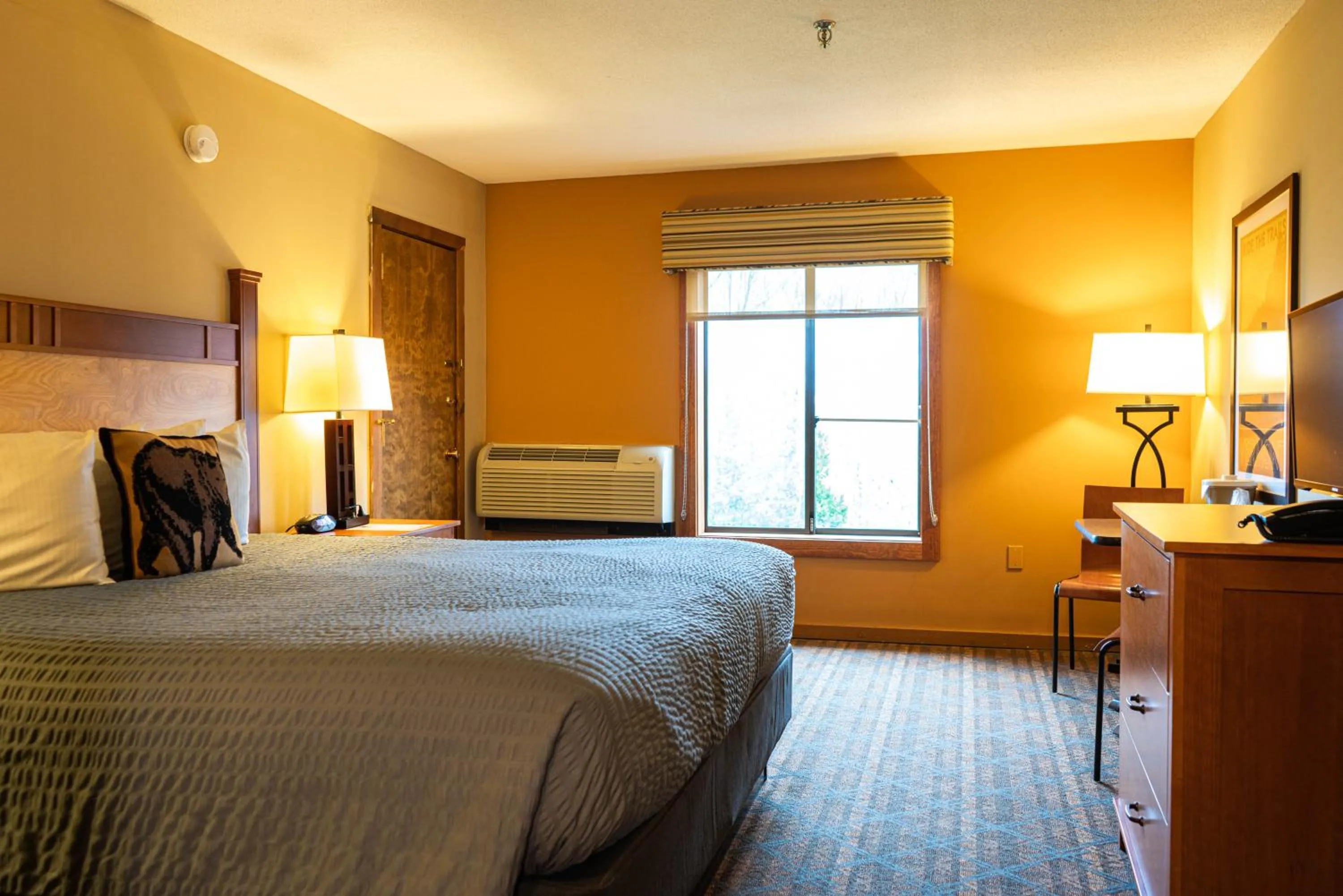 Bed in The Black Bear Lodge at Stratton Mountain Resort