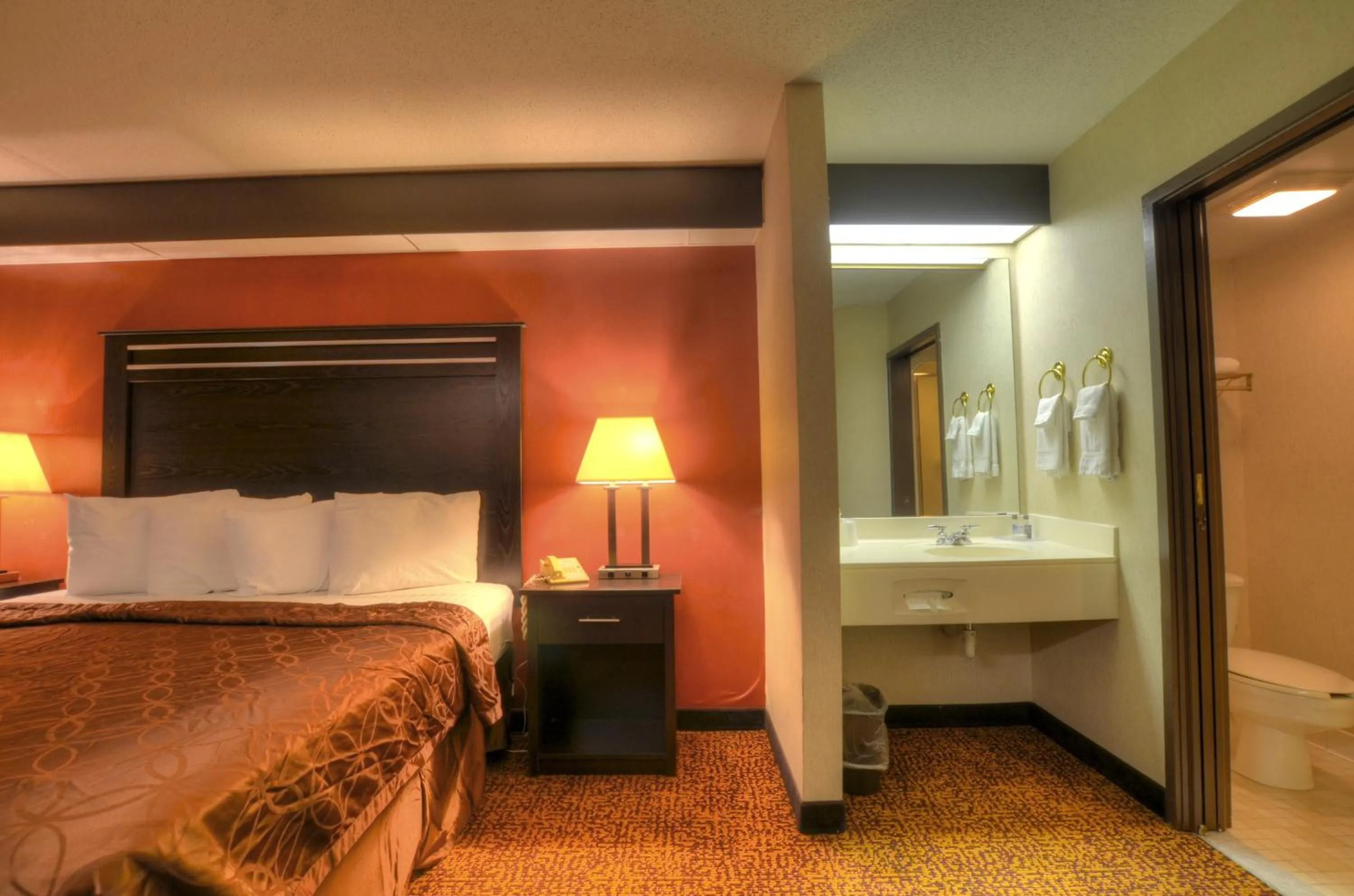 Bed in Smoky Mountain Inn & Suites