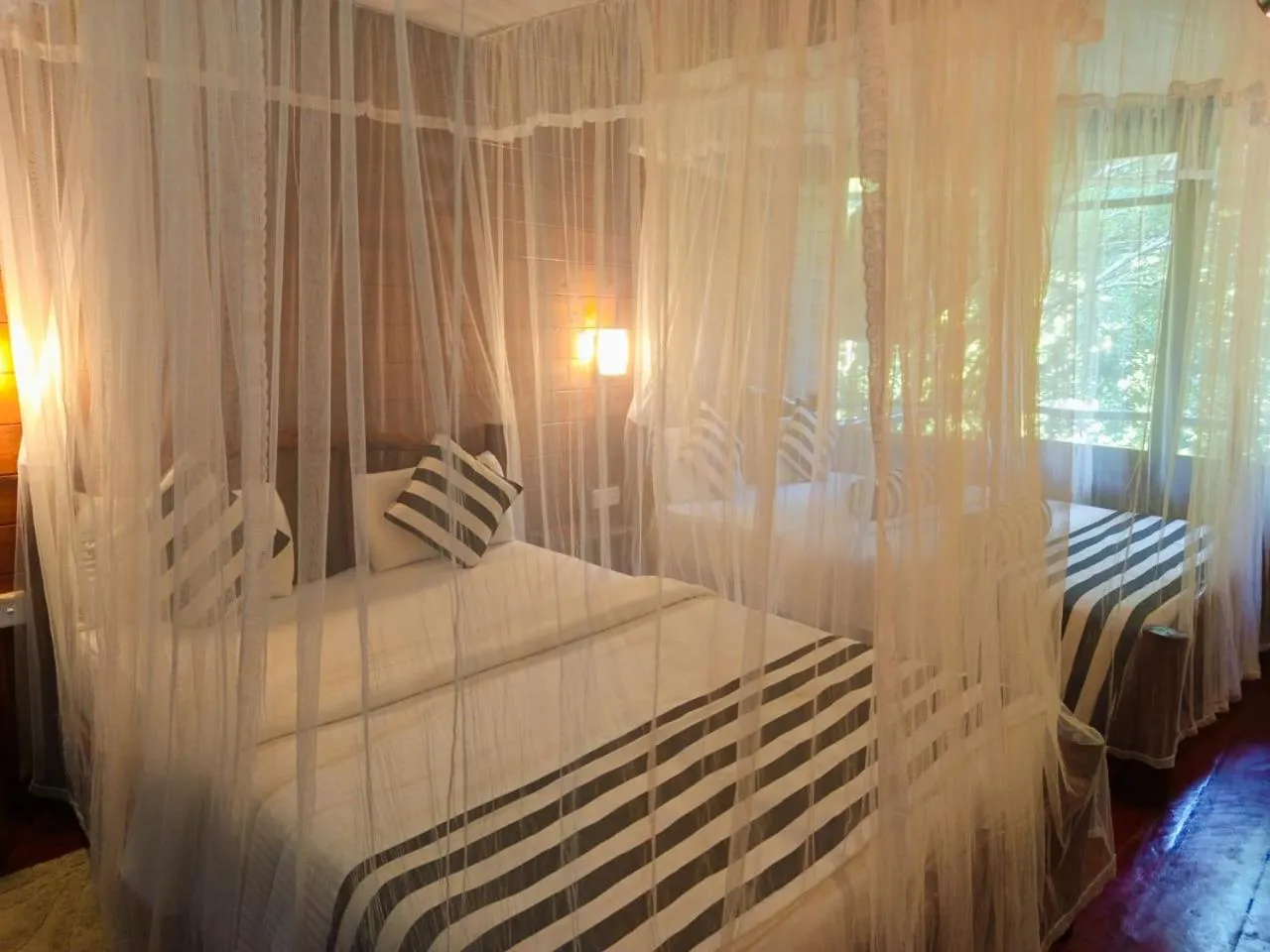 Bed in Jungle Face Inn