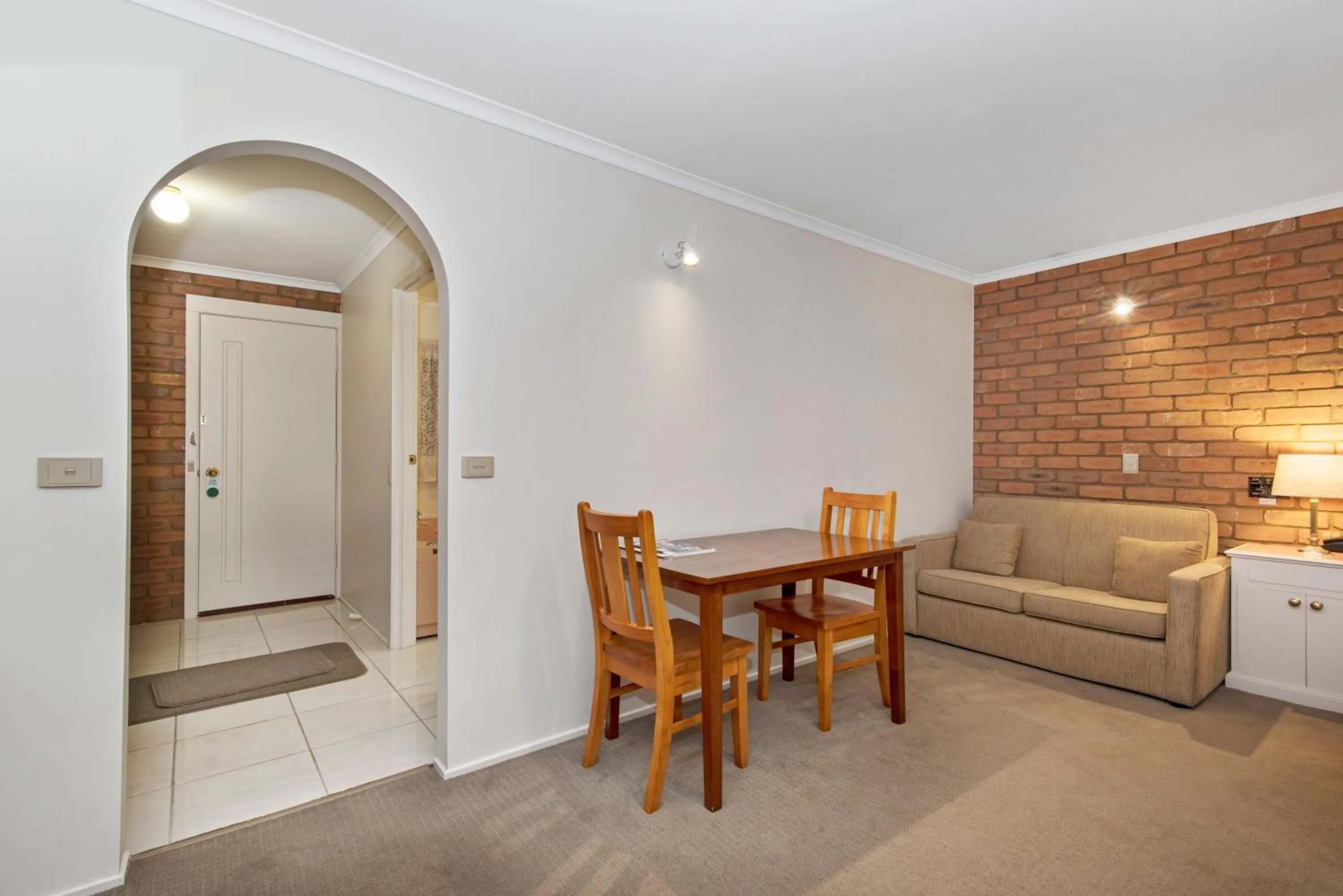Seating area in Golden Square Motor Inn