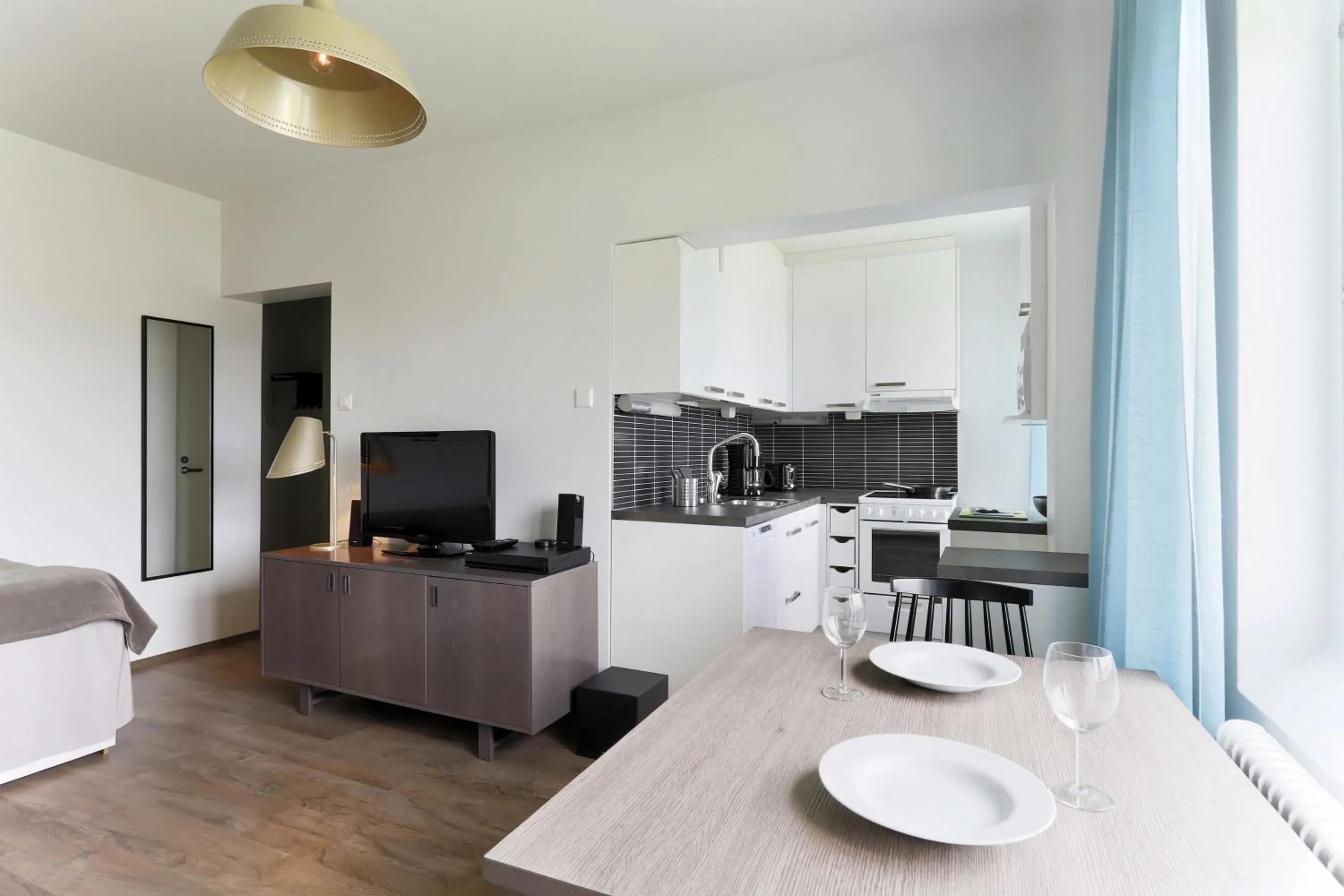 Kitchen or kitchenette in Forenom Serviced Apartments Helsinki Lapinlahdenkatu