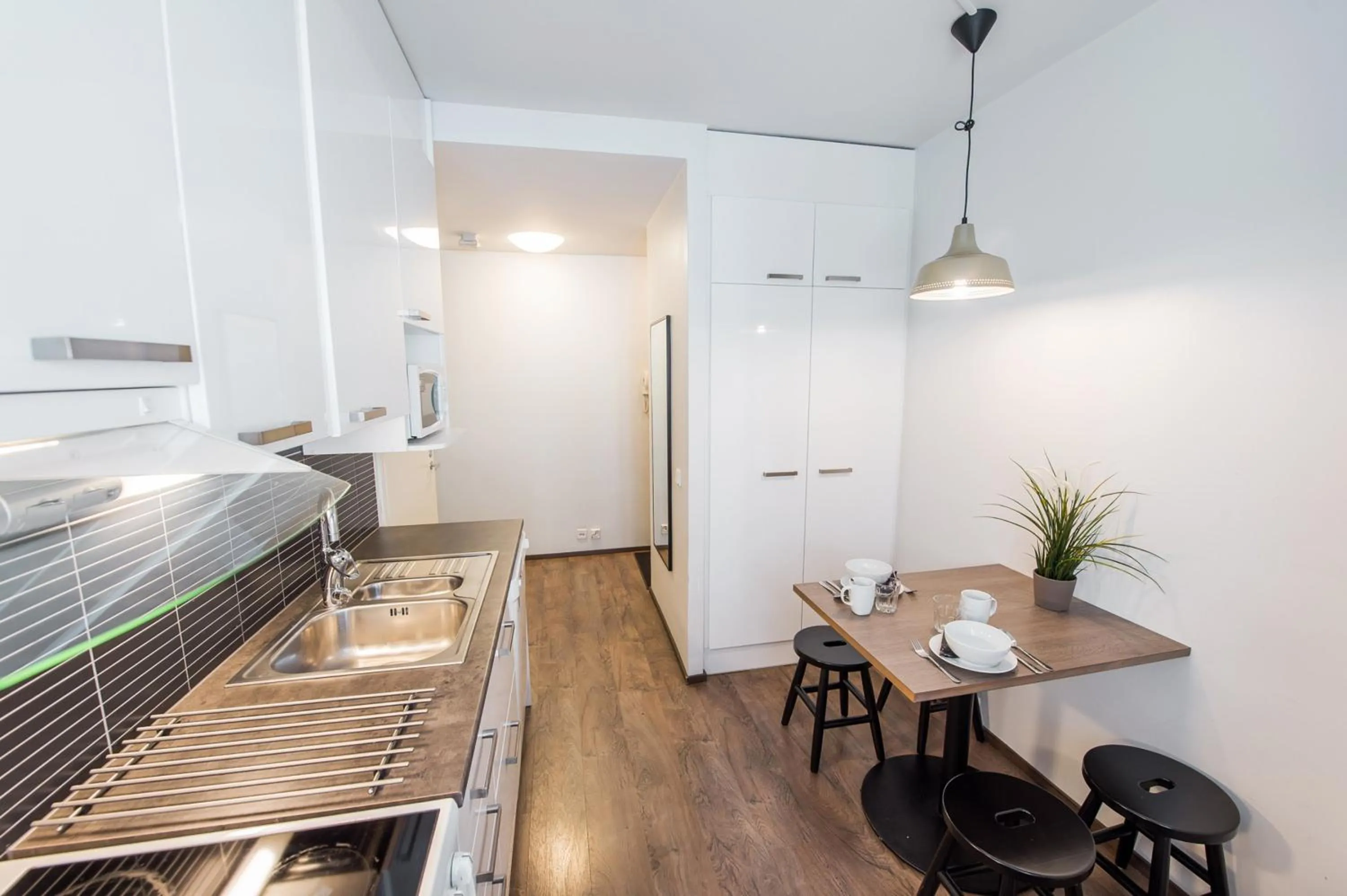 Kitchen or kitchenette in Forenom Serviced Apartments Helsinki Lapinlahdenkatu