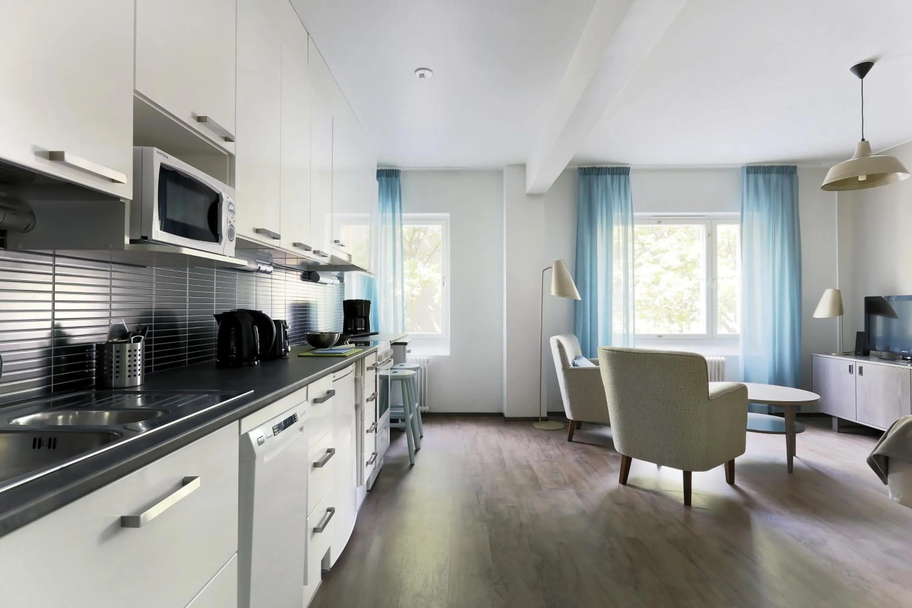 Kitchen or kitchenette in Forenom Serviced Apartments Helsinki Lapinlahdenkatu