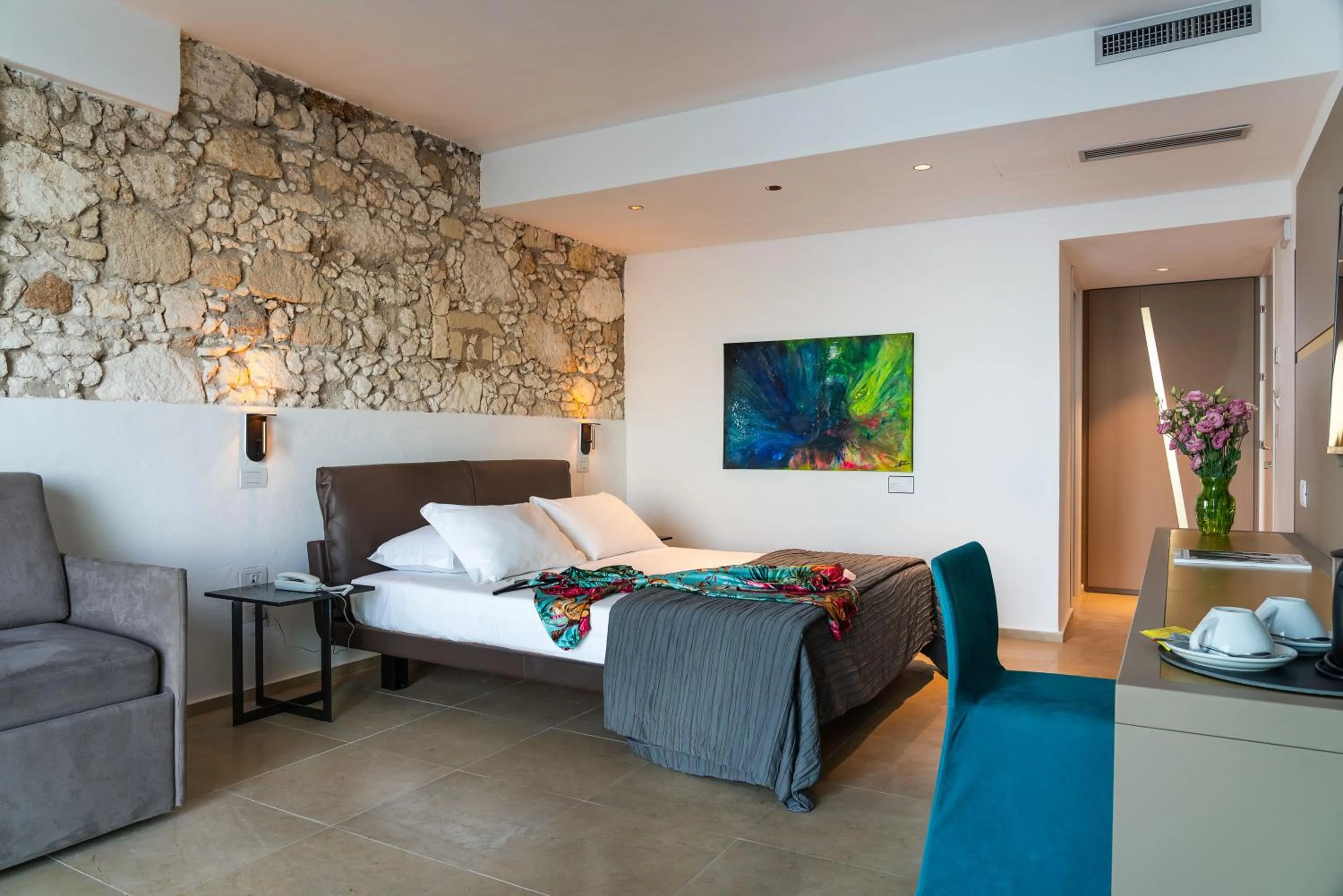 Bed in Re Dionisio Luxury Suites