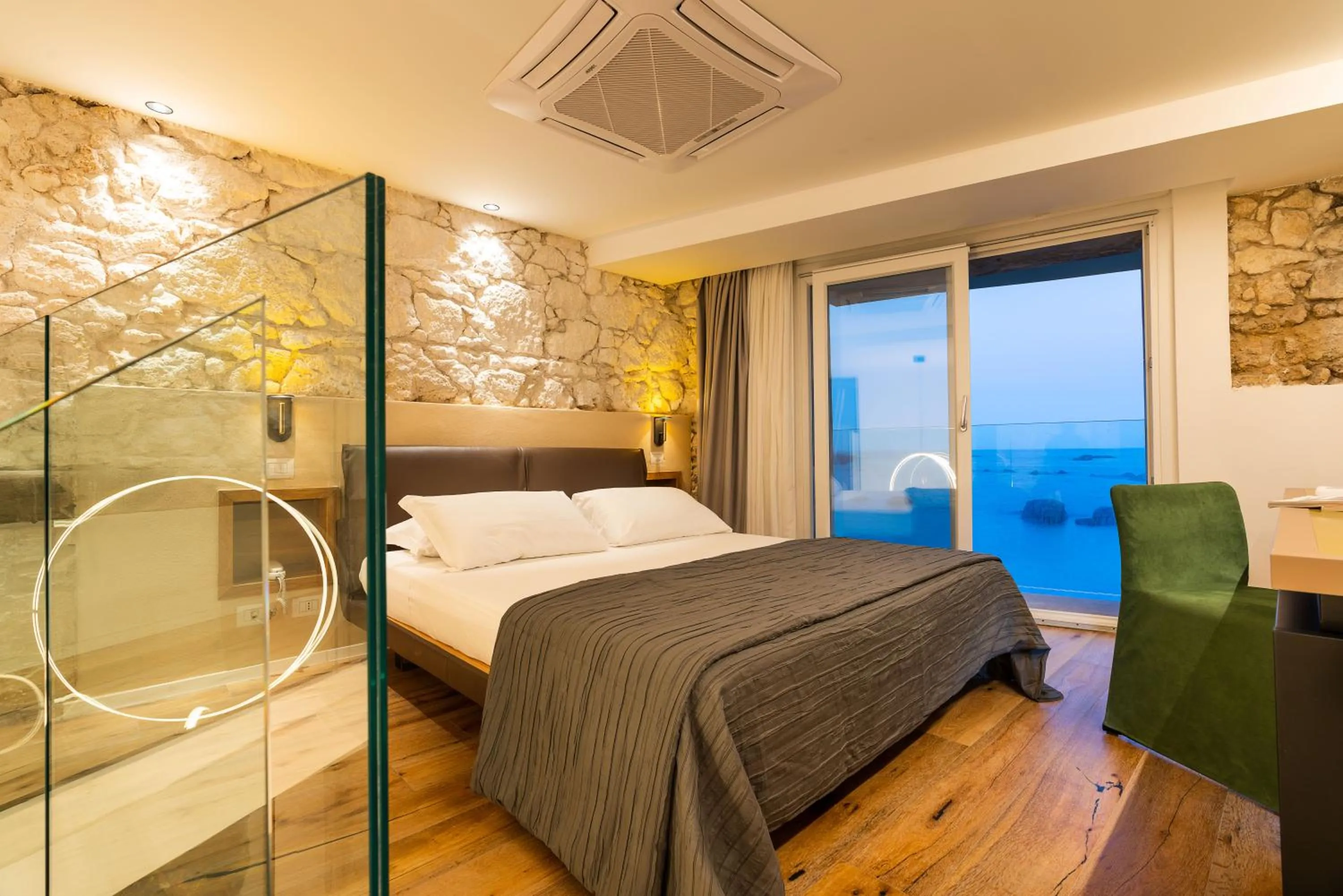 Bed in Re Dionisio Luxury Suites