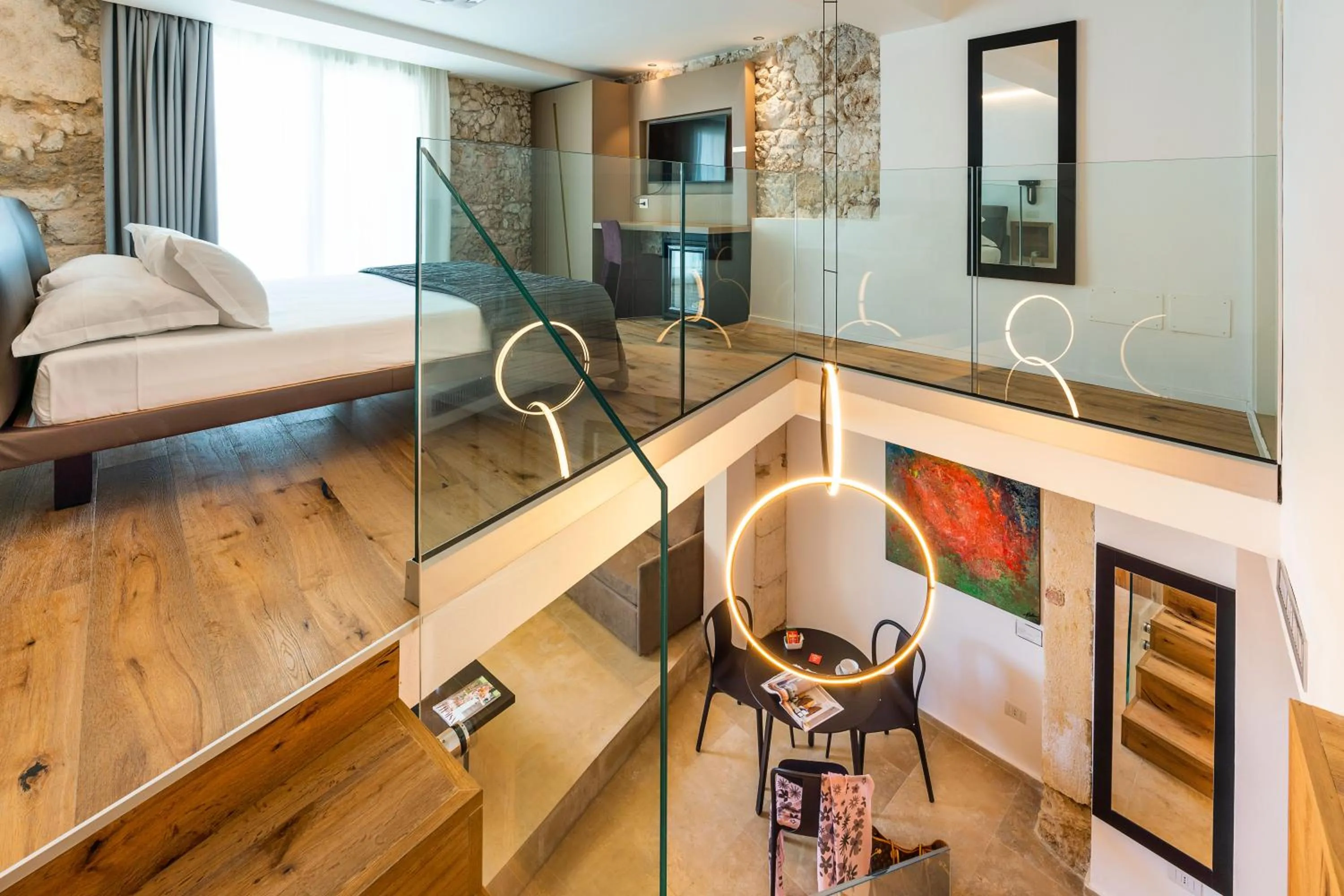 Bed in Re Dionisio Luxury Suites