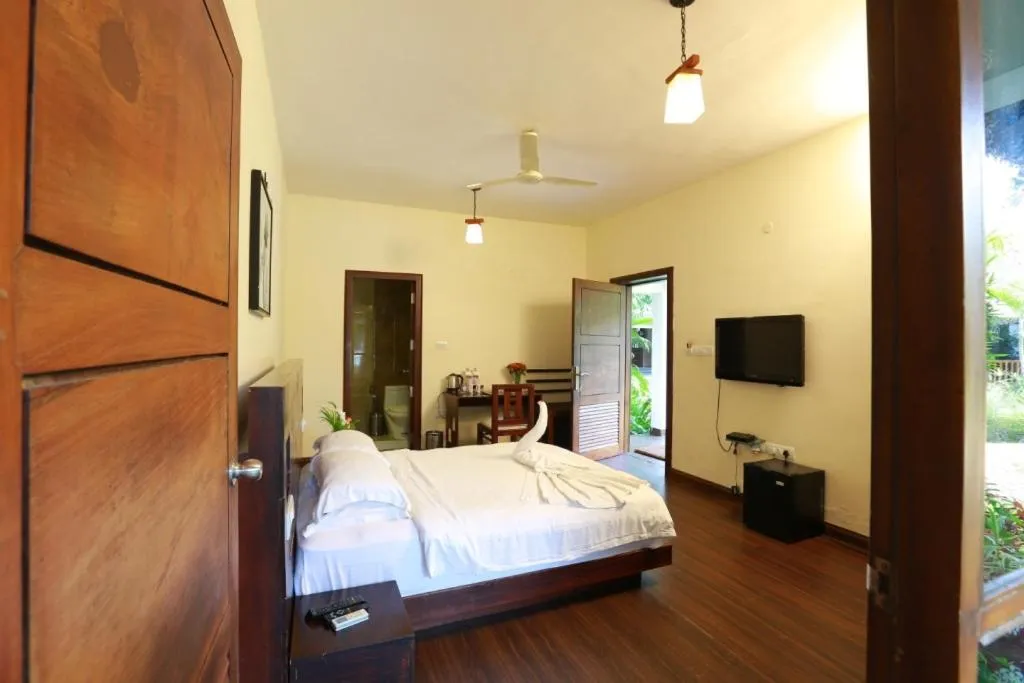 Bed in Deshadan Backwater Resort - The best sunrise view