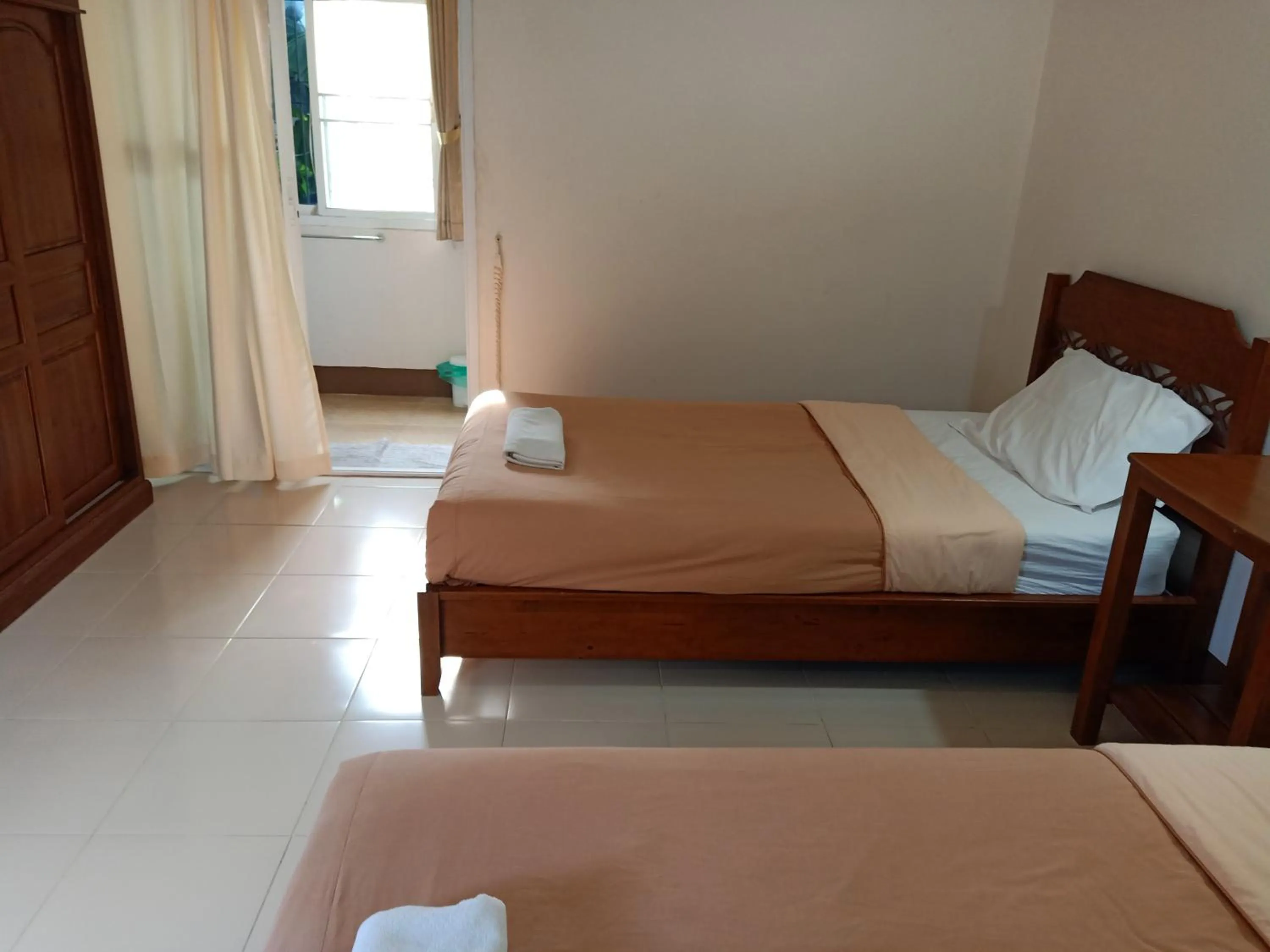 Bed in Phumchan Place Hotel