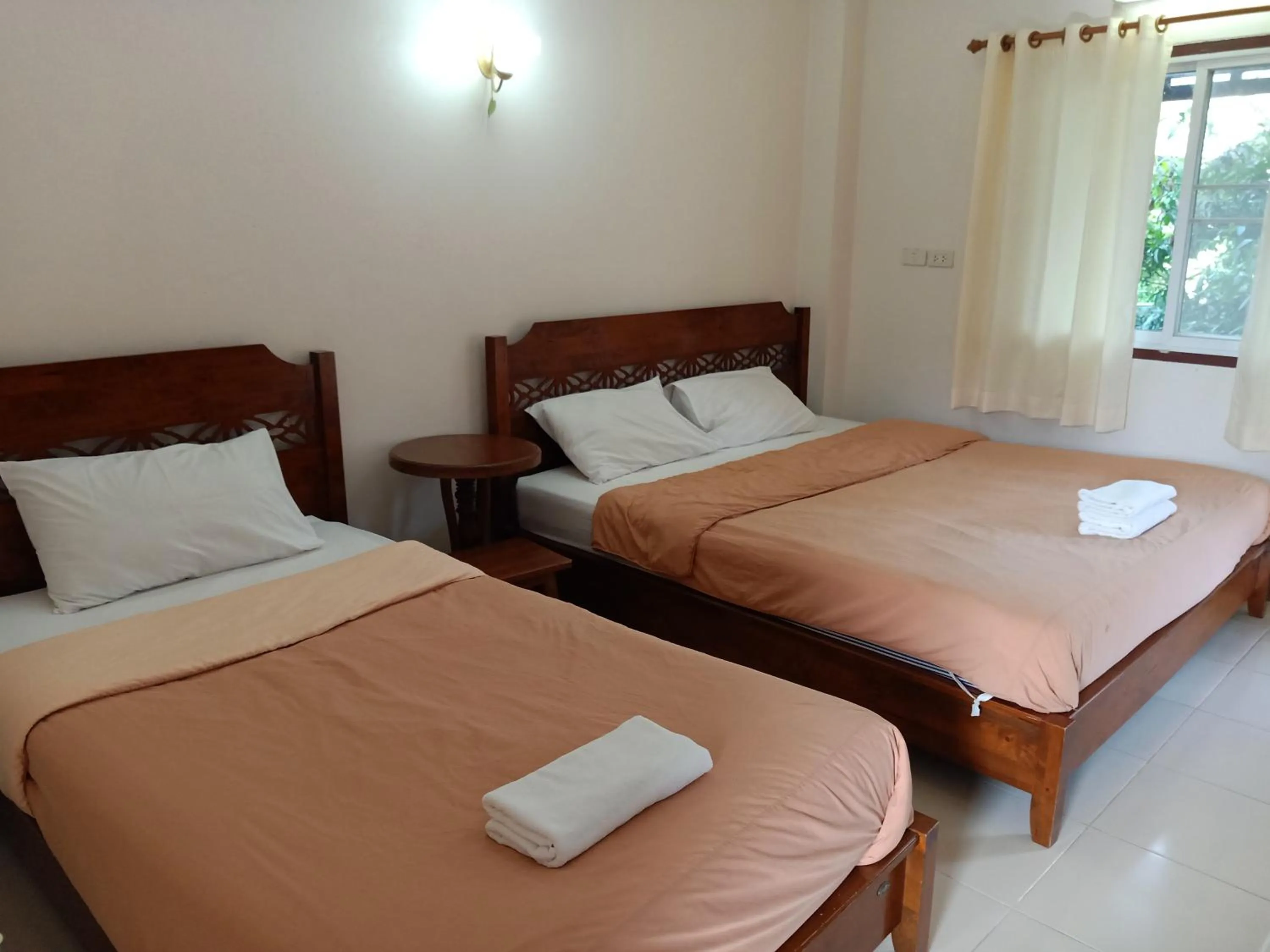 Bed in Phumchan Place Hotel