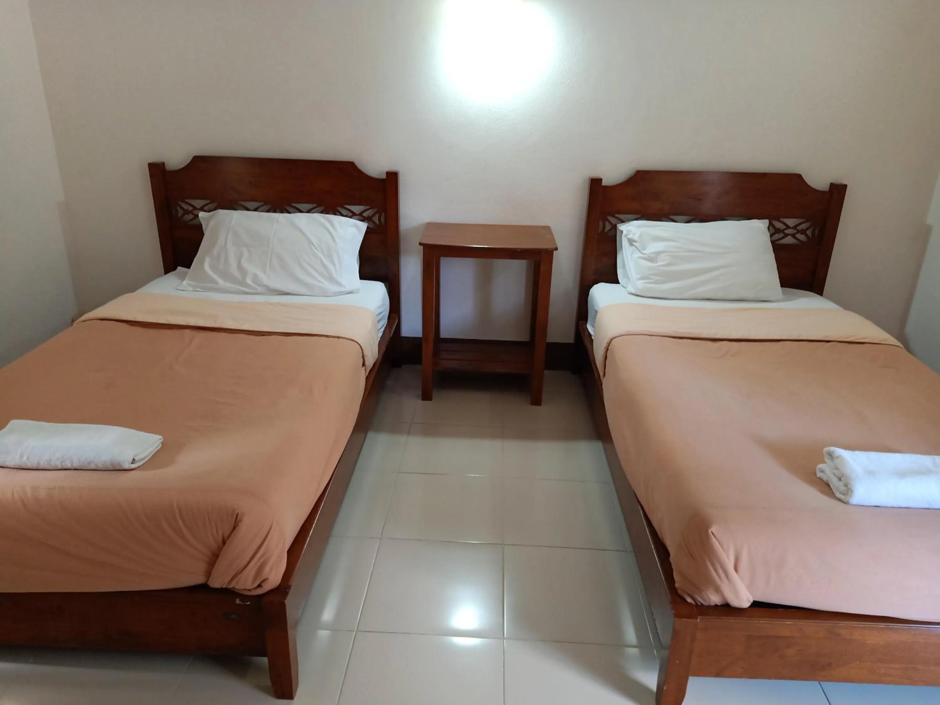 Bed in Phumchan Place Hotel