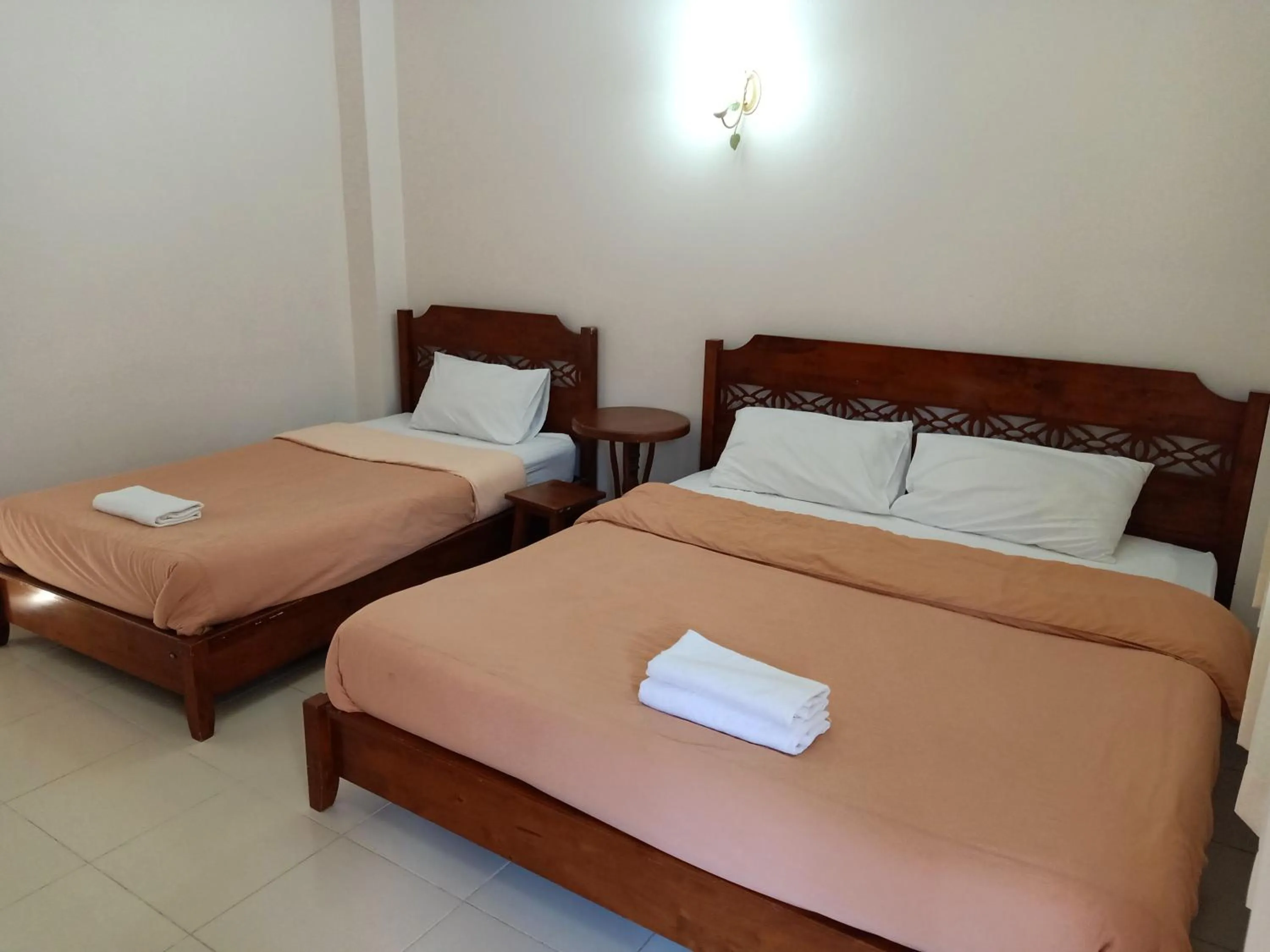 Bed in Phumchan Place Hotel