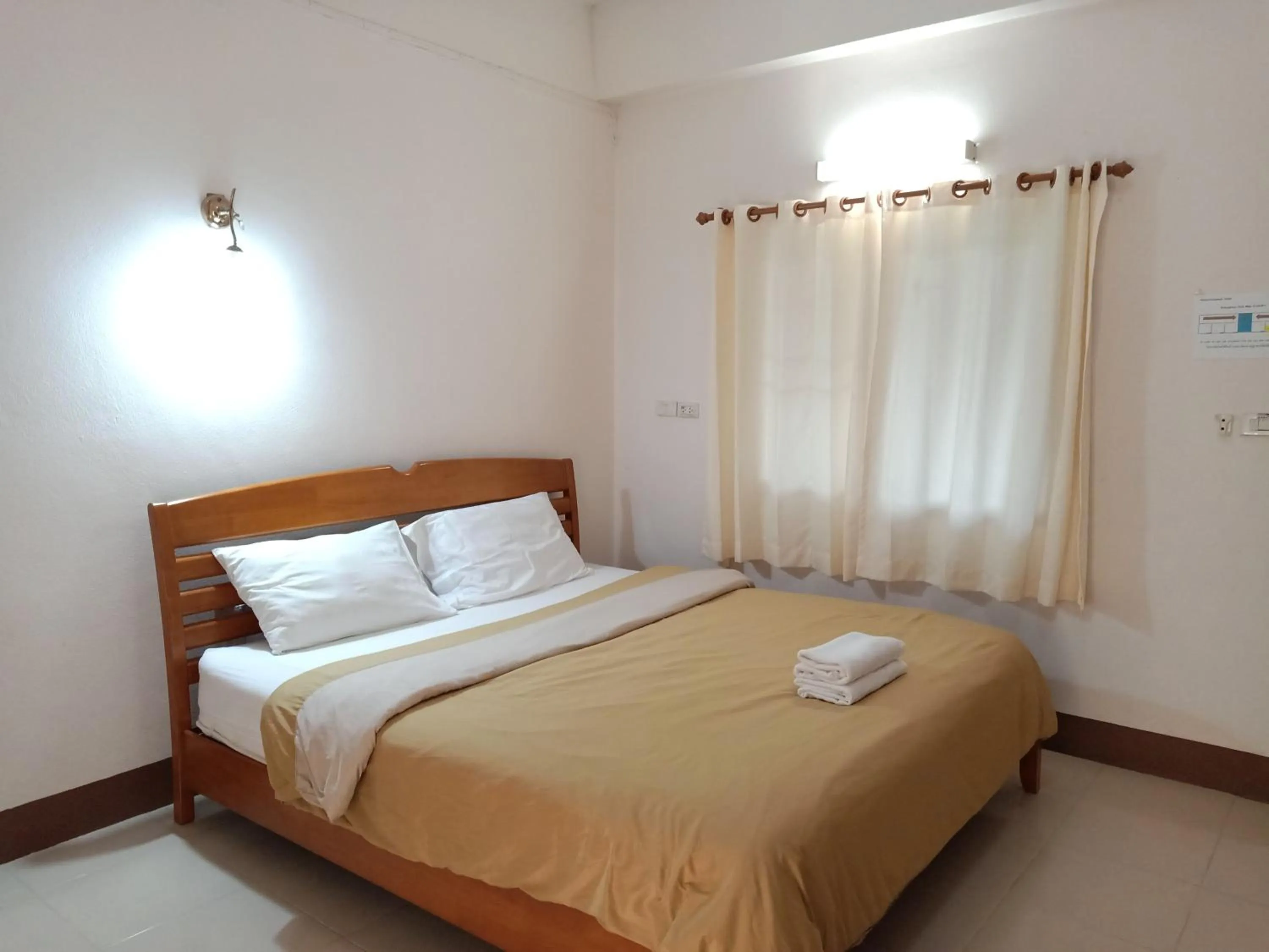 Bed in Phumchan Place Hotel