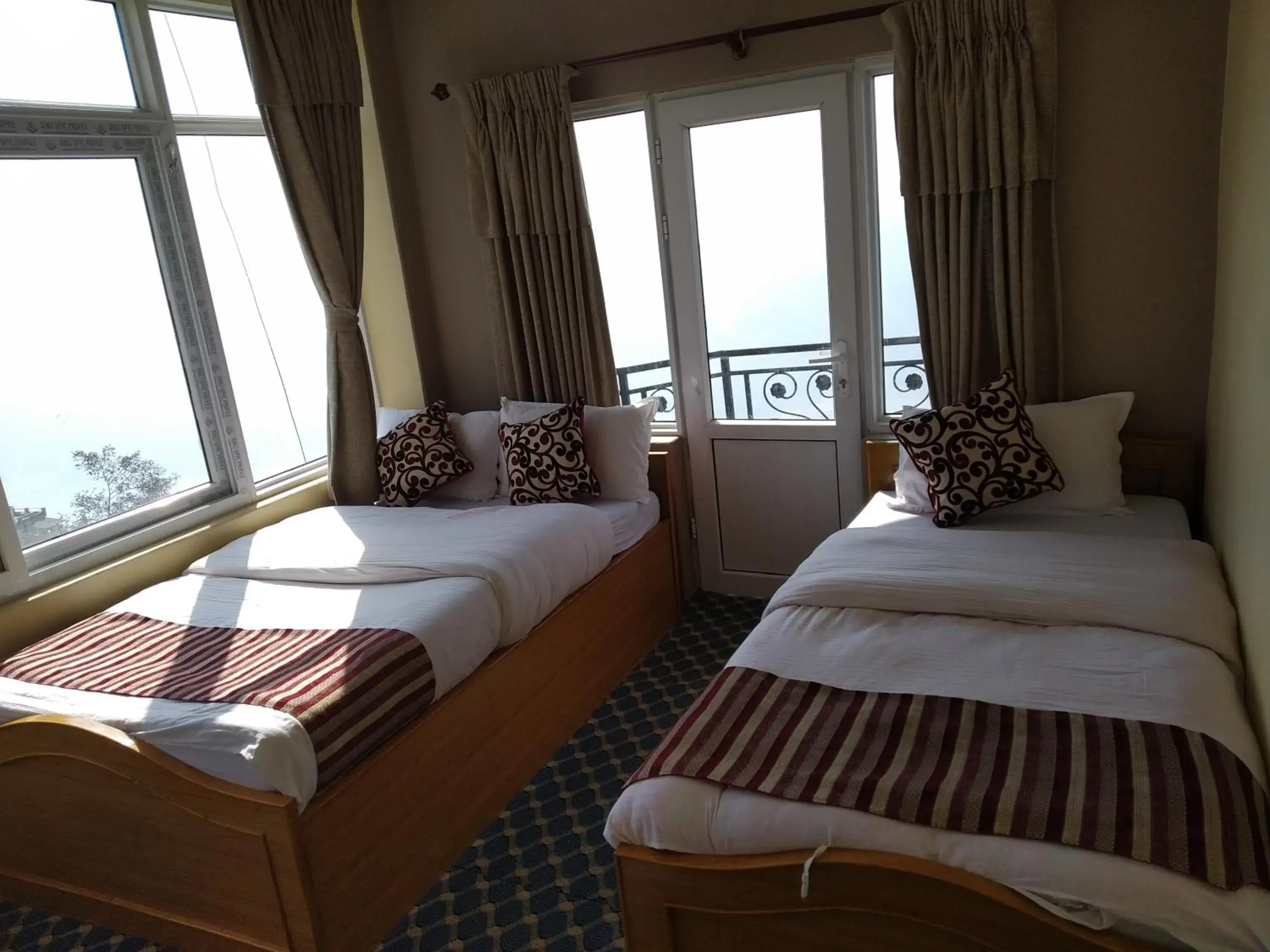 Triple Room with Balcony in Hotel High Ground Inn Sarangkot Triple Room with Balcony in Hotel High Ground Inn Sarangkot