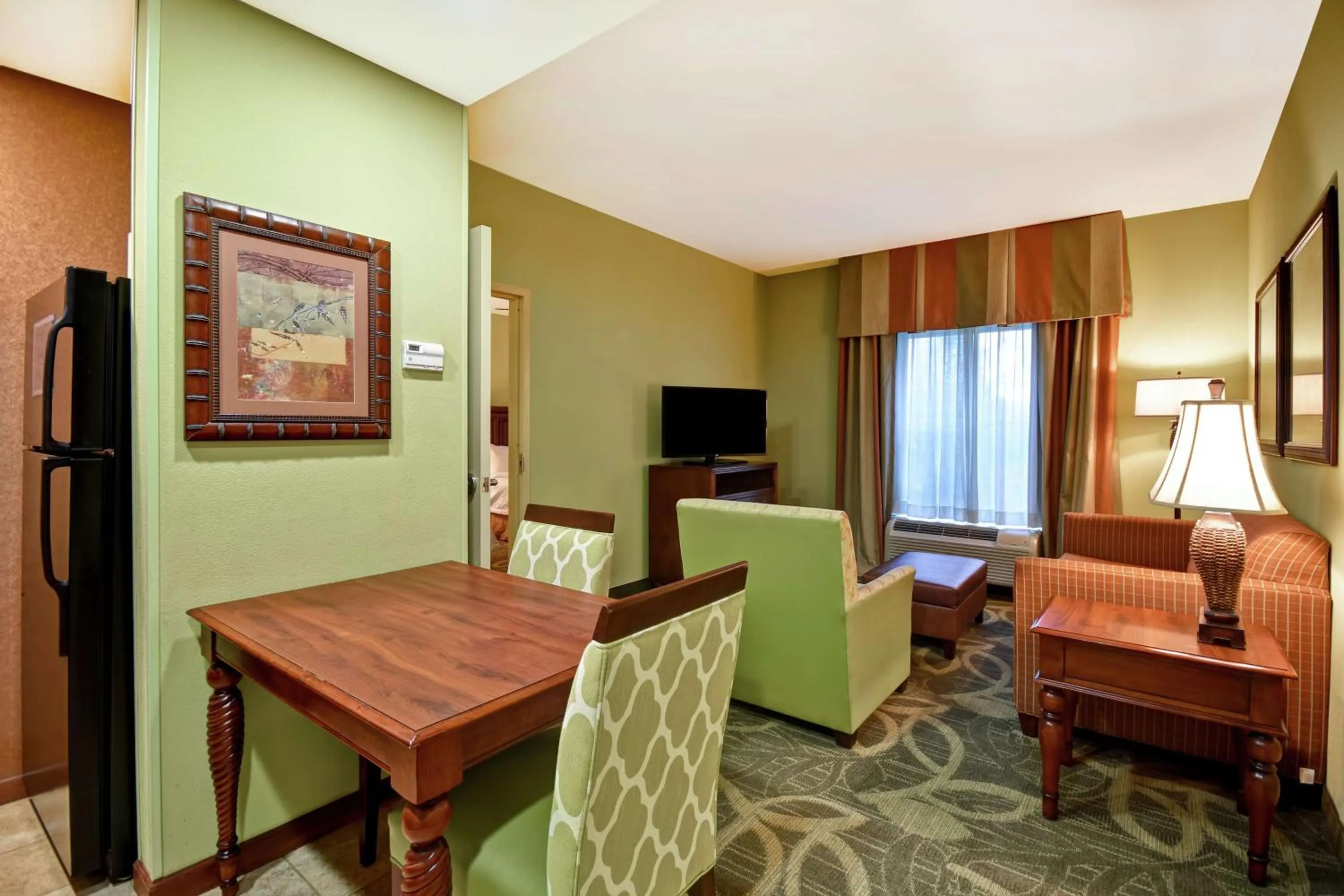 Bedroom in Homewood Suites by Hilton Ocala at Heath Brook