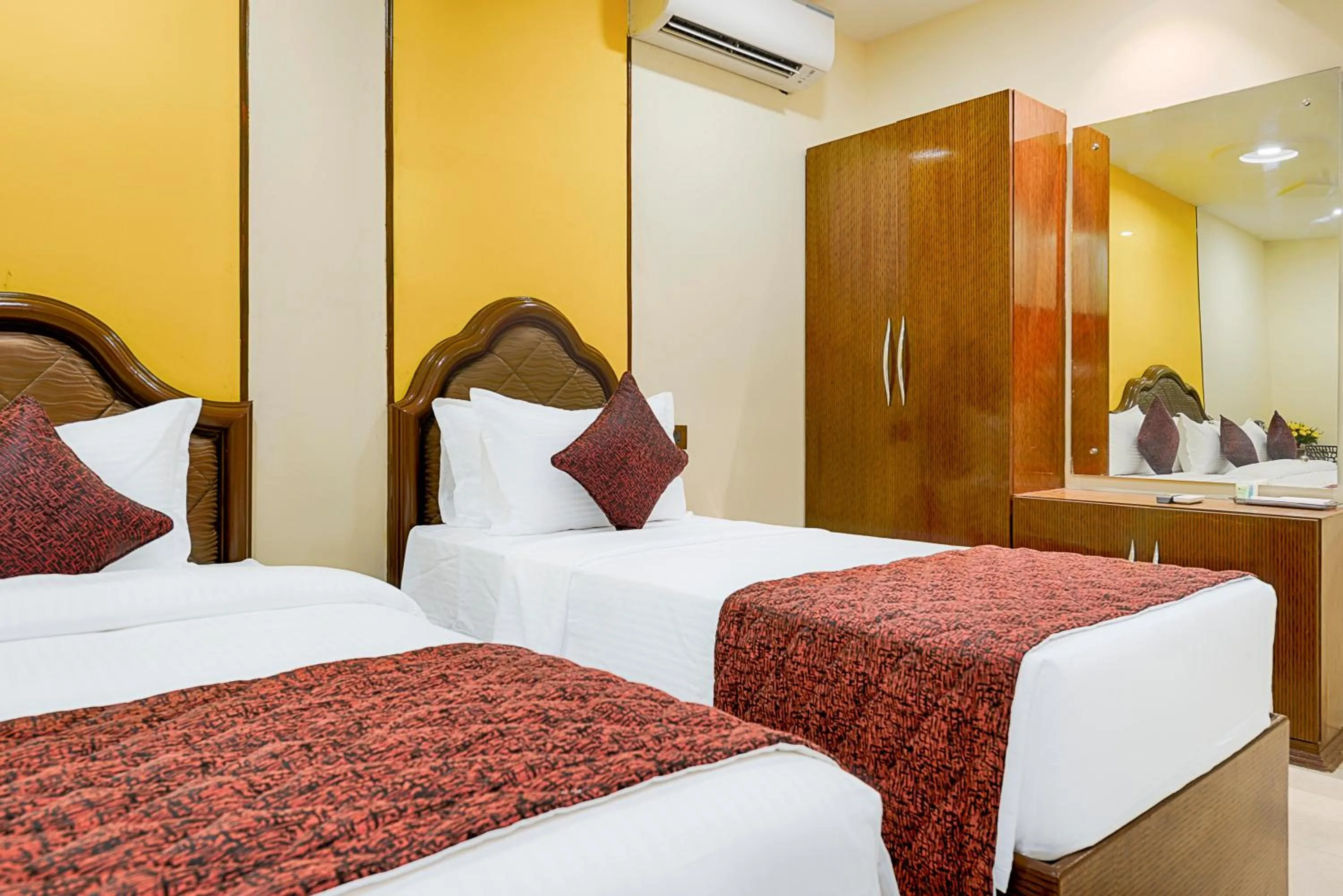 Bed in Hotel Ramraj Regency