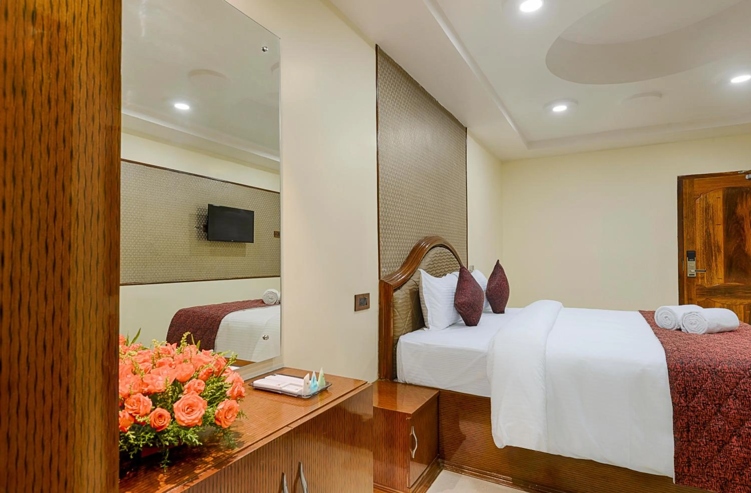 Bed in Hotel Ramraj Regency