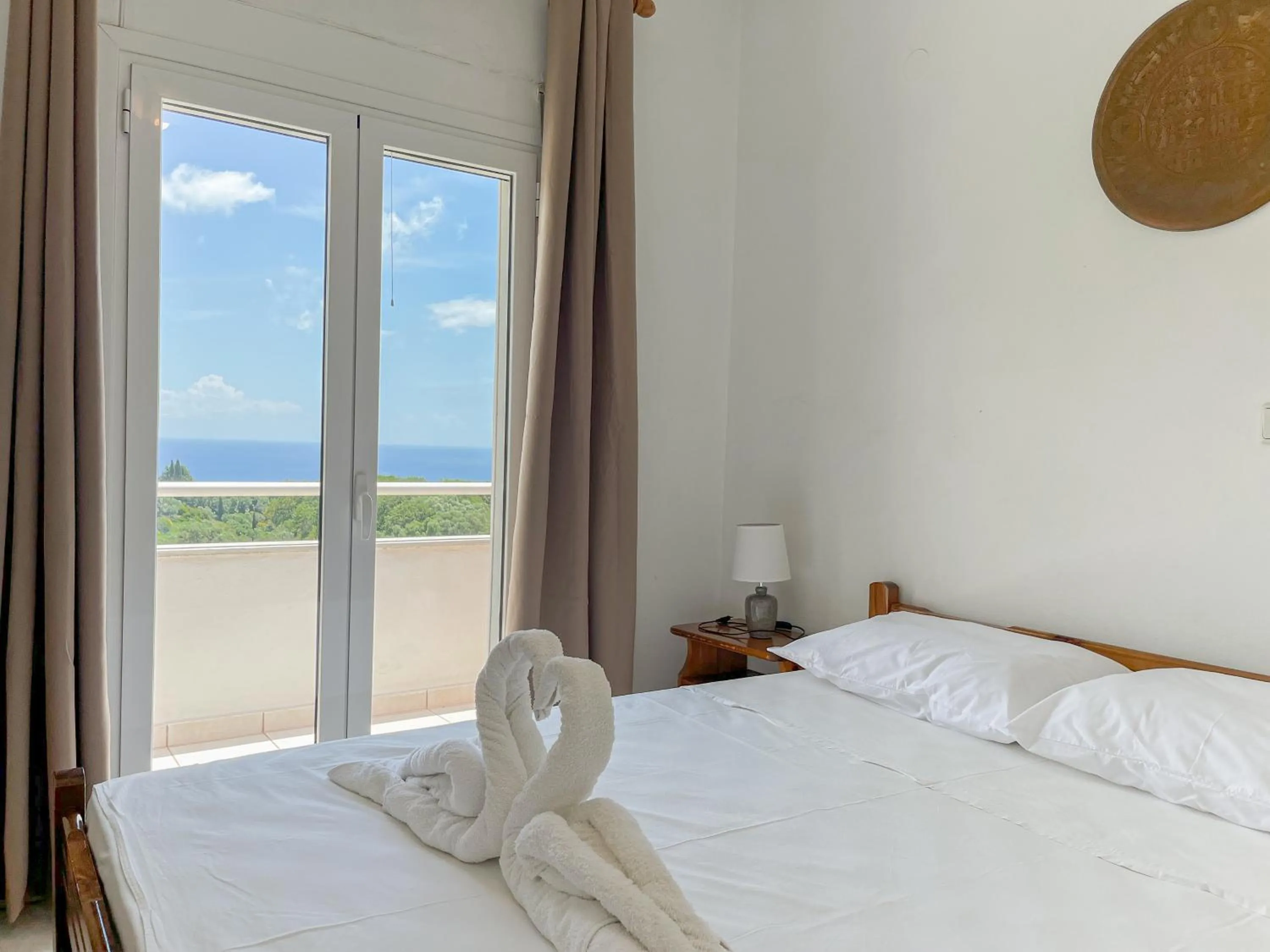 Bed in Amazona Apartments and Studios