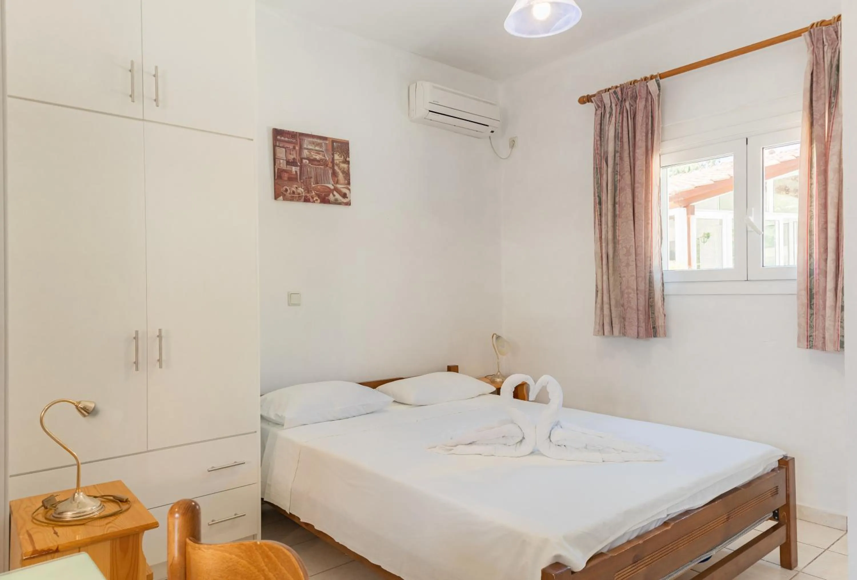 Bed in Amazona Apartments and Studios