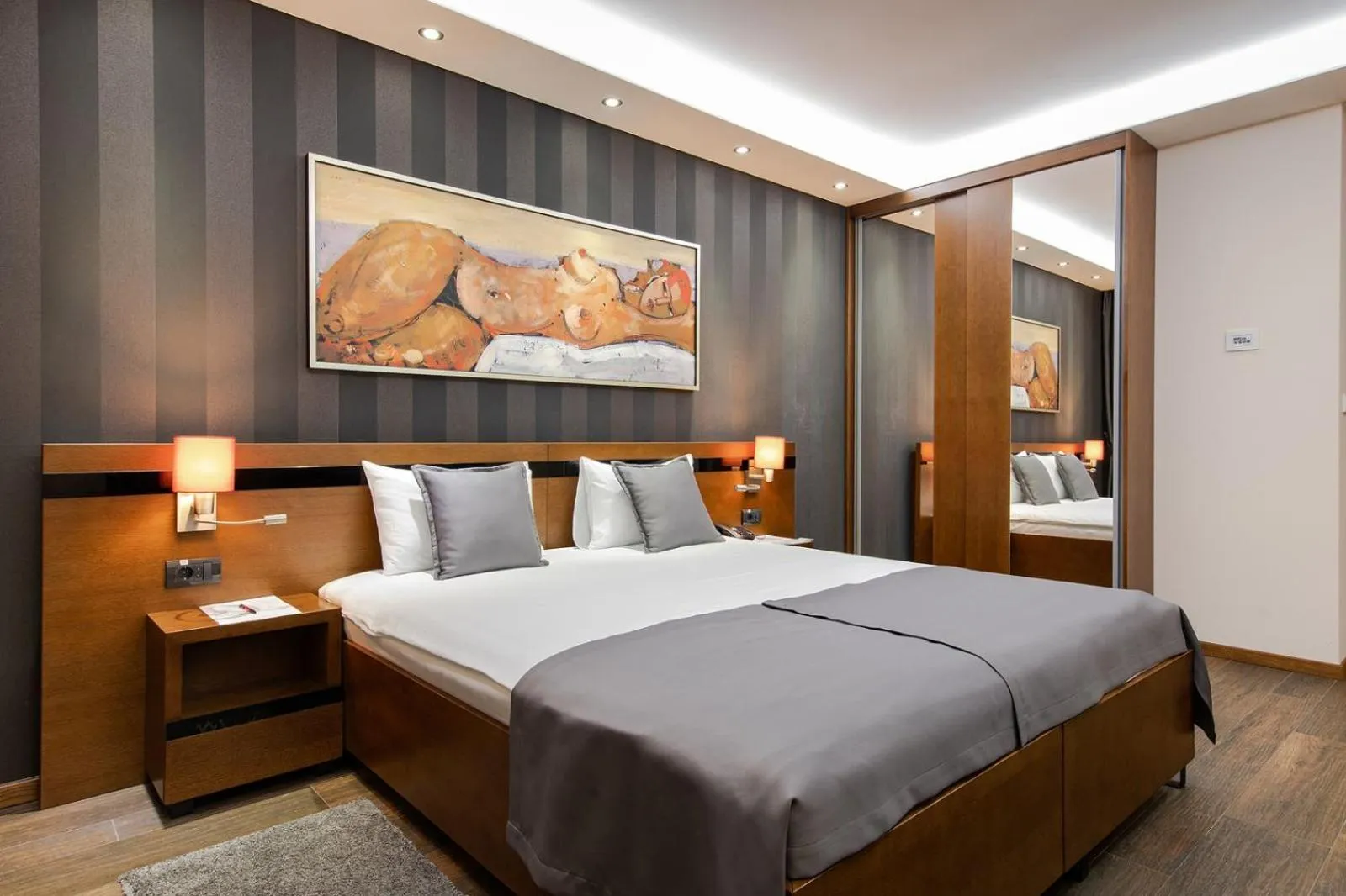 Bed in Rubicon Garni Hotel