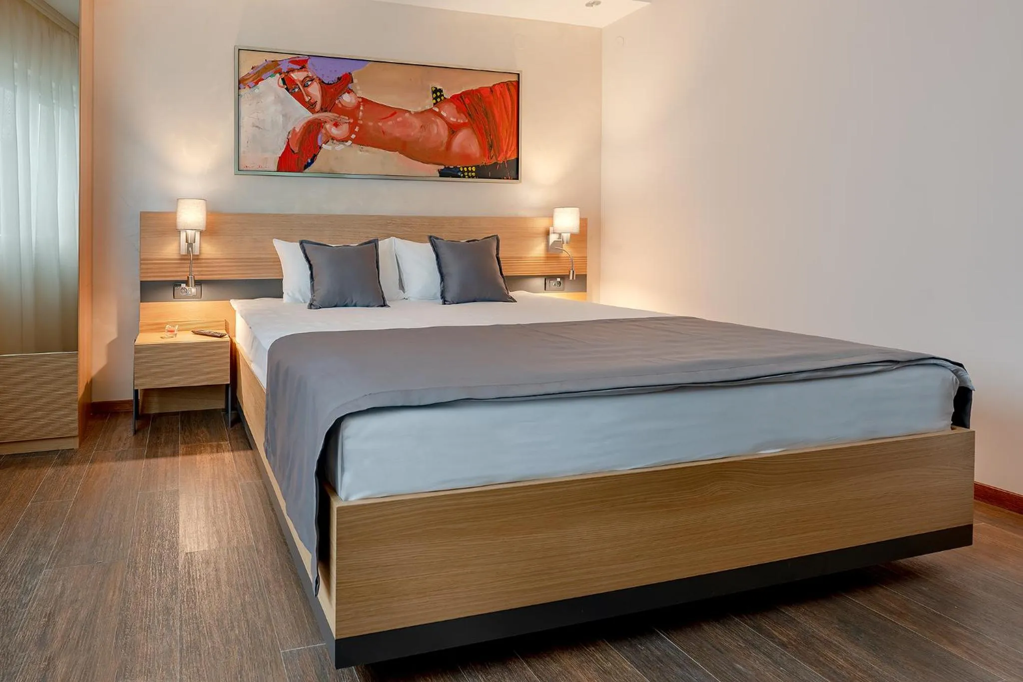 Bed in Rubicon Garni Hotel