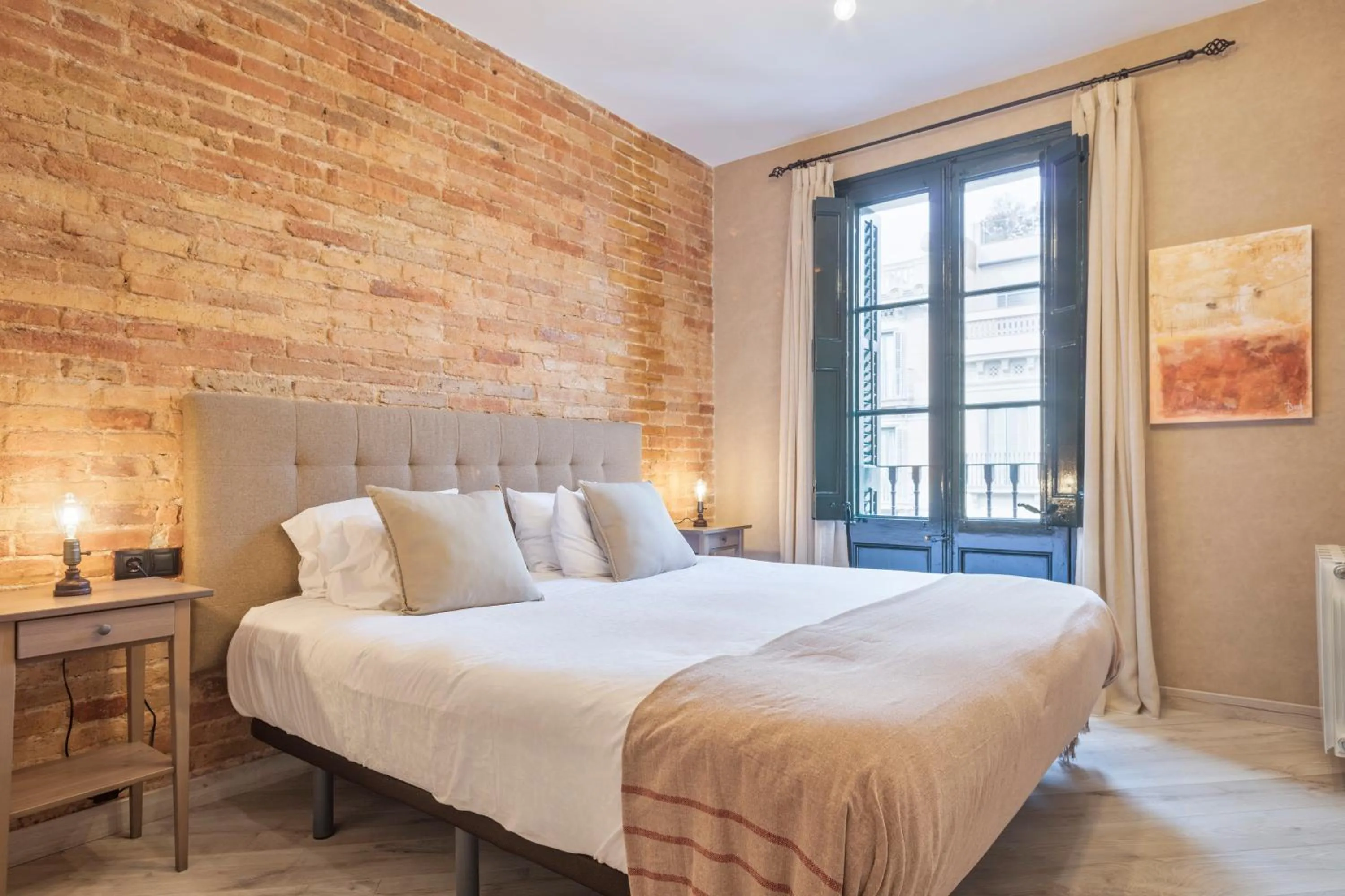 Bed in Midtown Luxury Apartments by Sweett