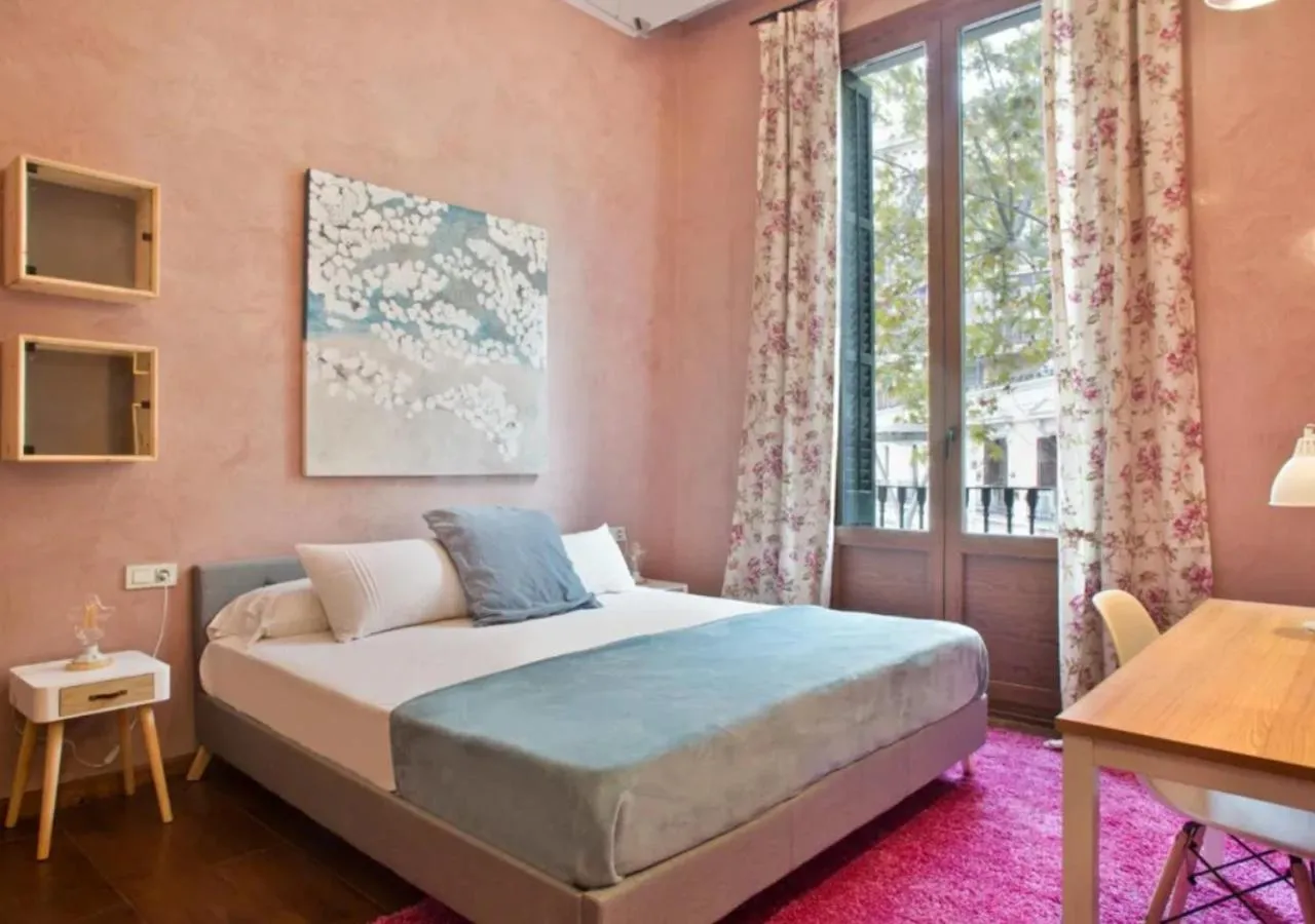 Bed in Midtown Luxury Apartments by Sweett