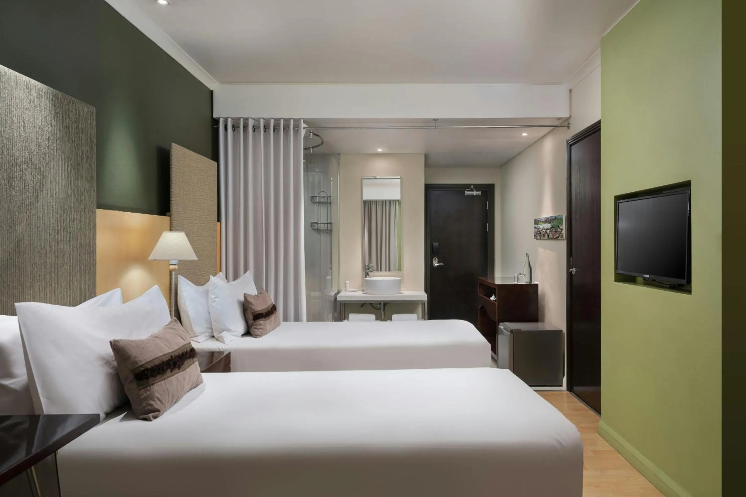 Photo of the whole room, Bed in Protea Hotel by Marriott Bloemfontein Willow Lake