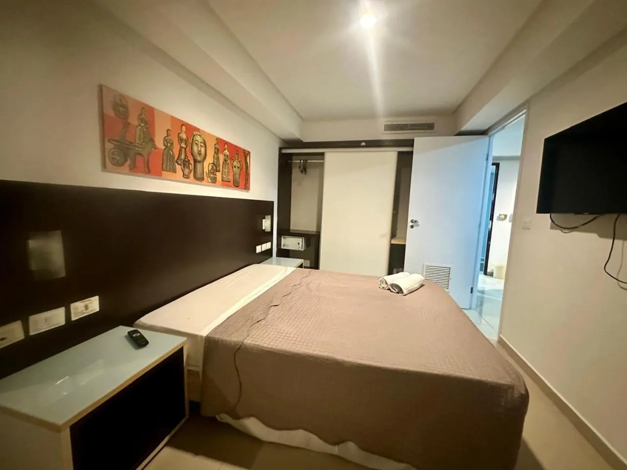 Bed in FLAT MARINAS PRAIA HOTEL