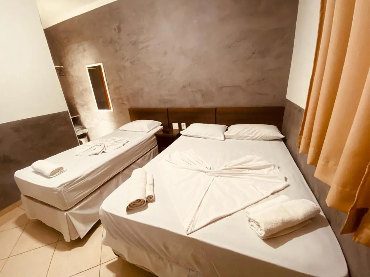 Bed in Pousada Jovimar