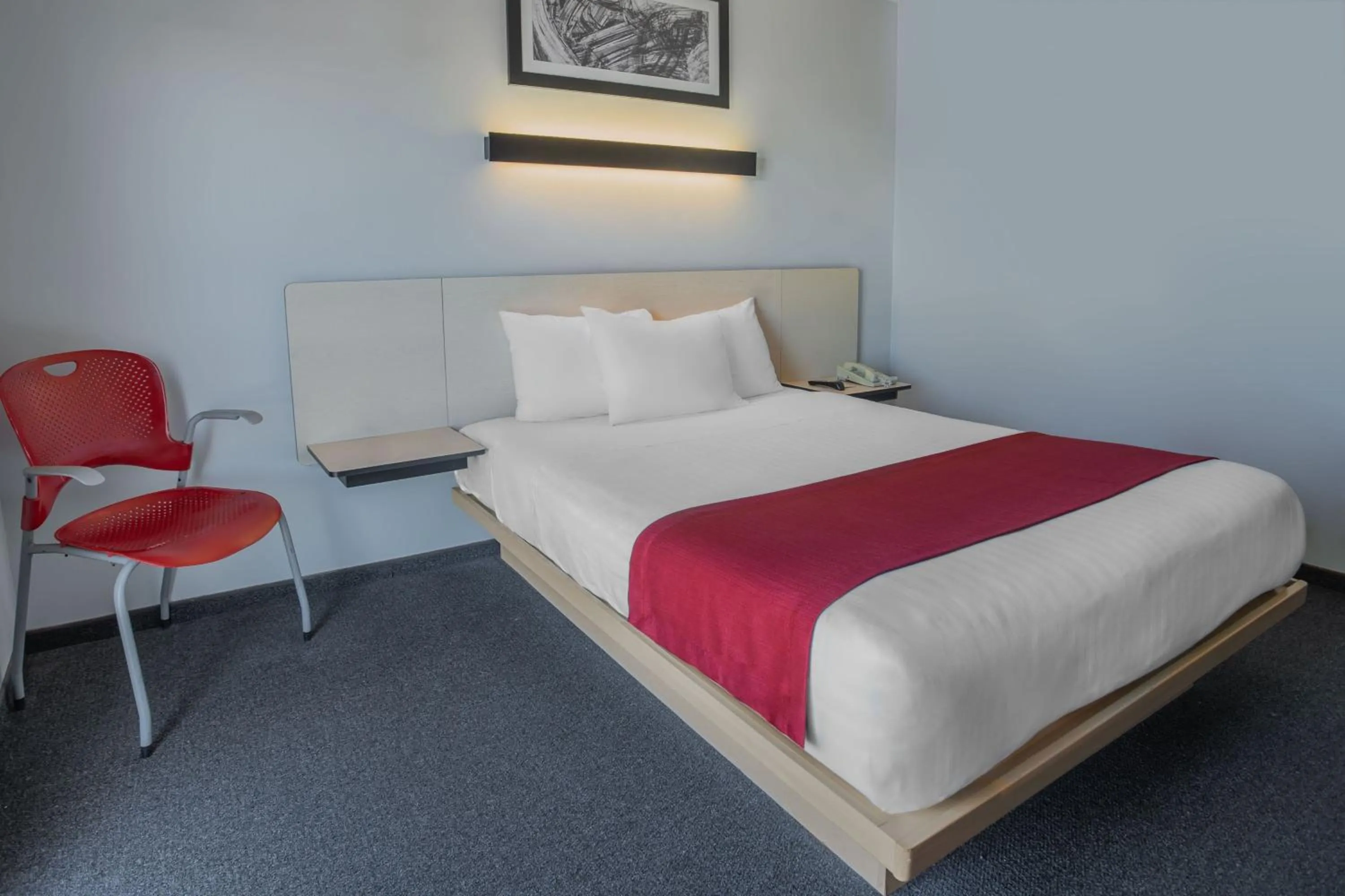 Photo of the whole room, Bed in City Express by Marriott Durango