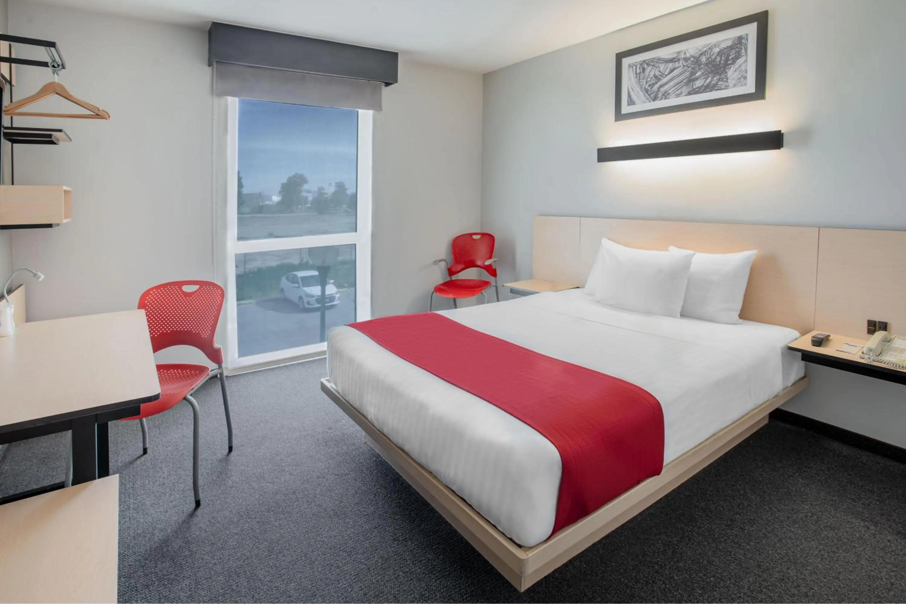 Photo of the whole room, Bed in City Express by Marriott Durango