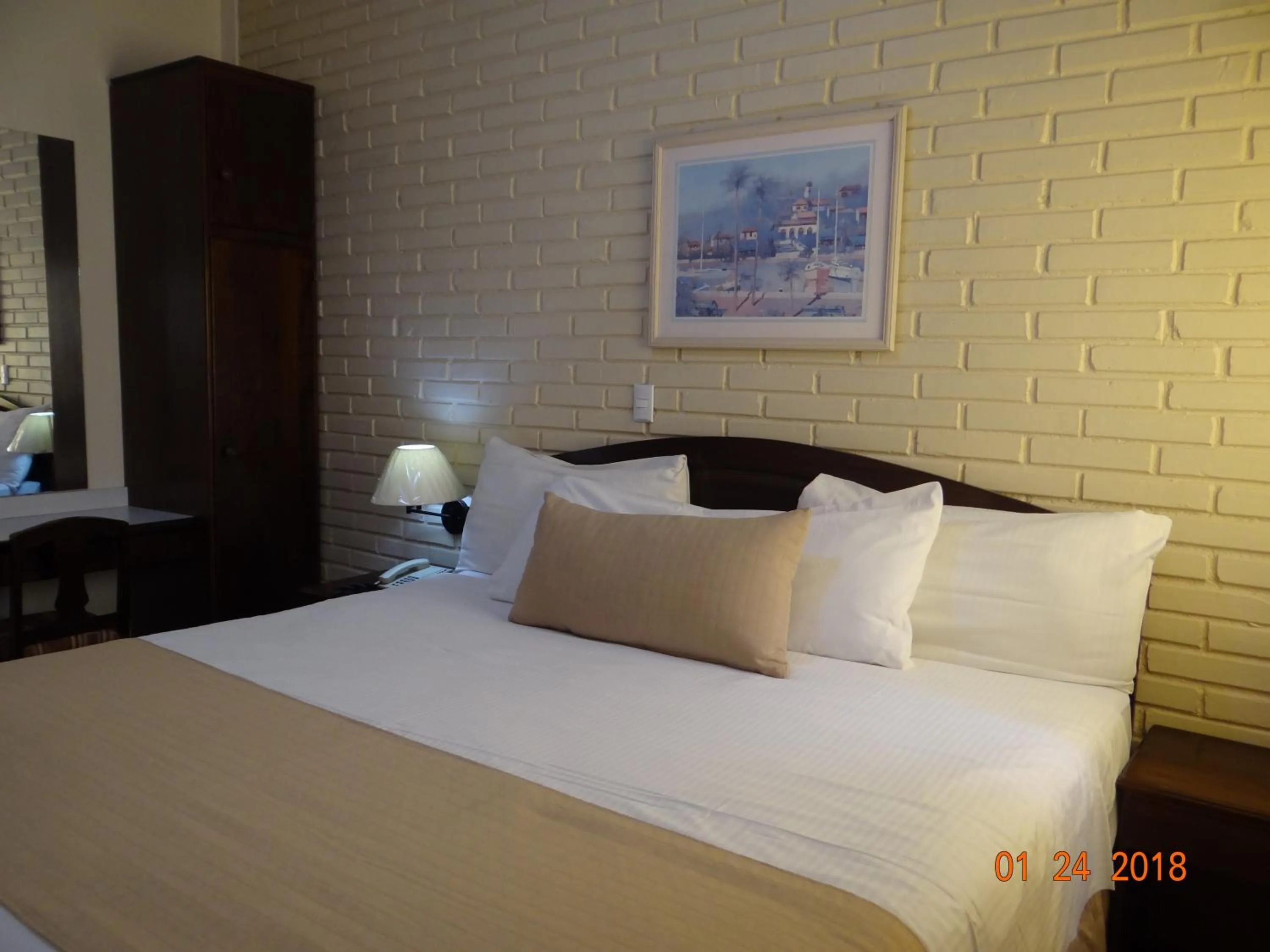 Bed in Hotel Mac Arthur