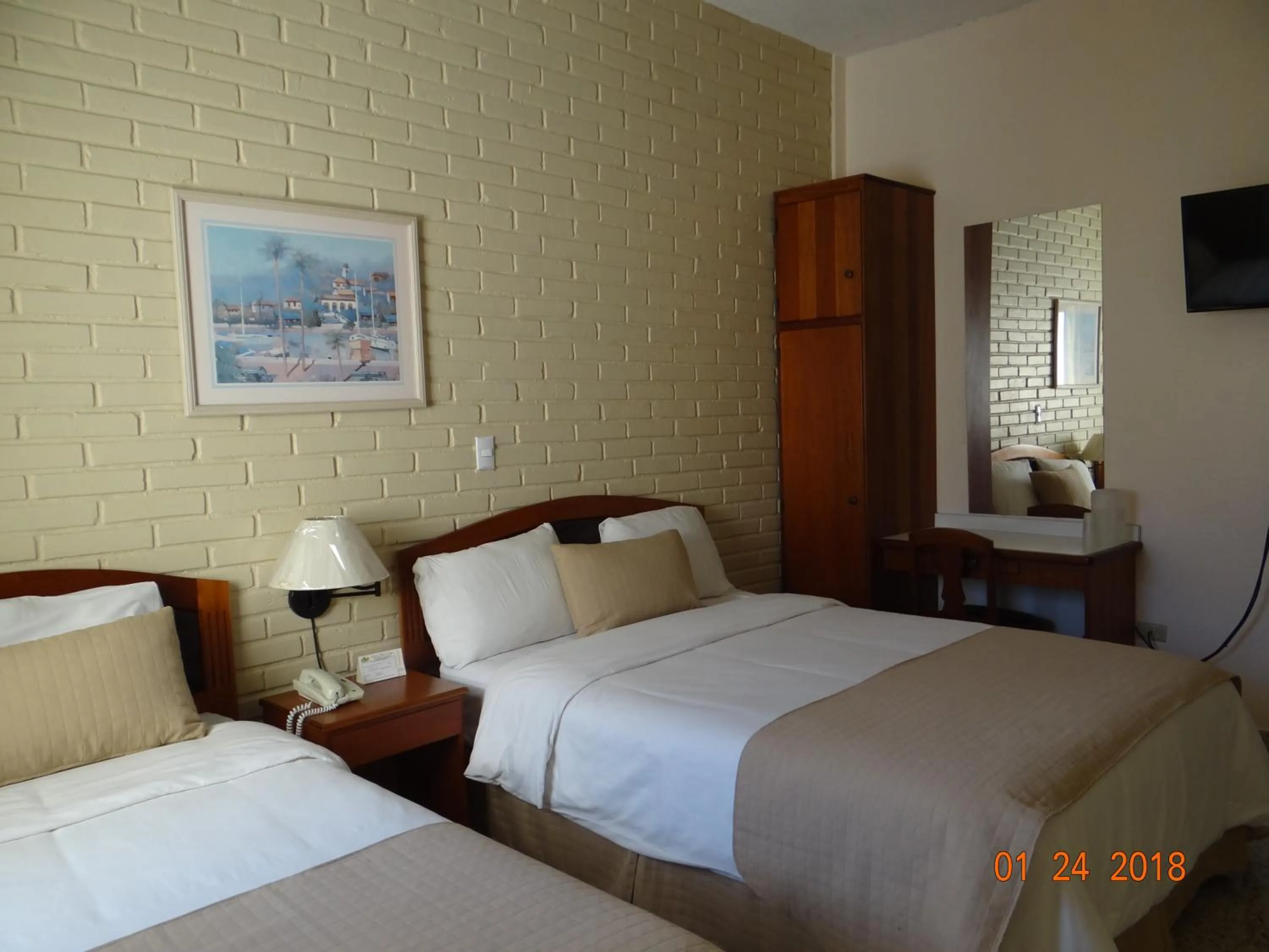 Bed in Hotel Mac Arthur