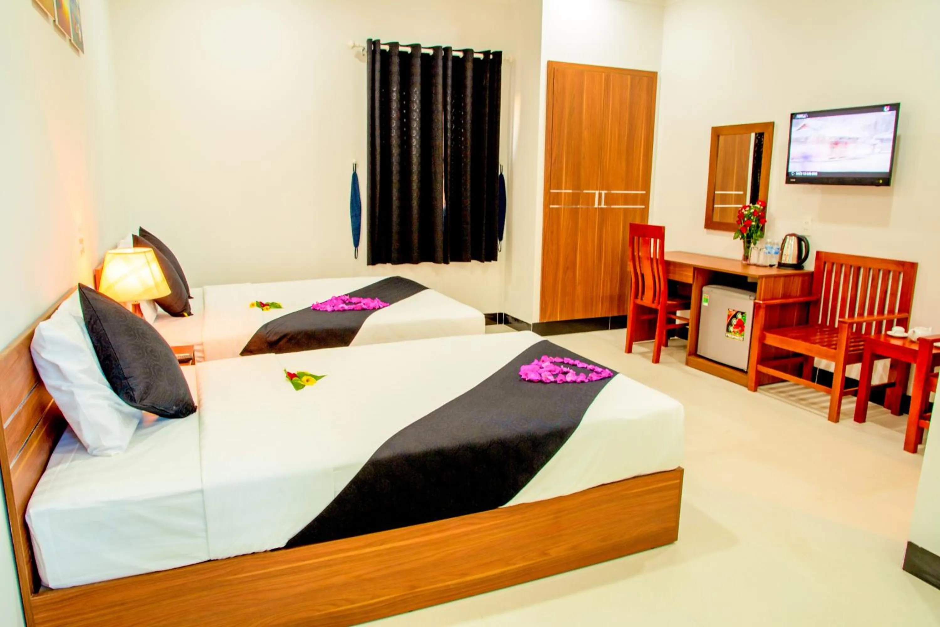 Bed in PHAM GIA HOTEL Mui Ne