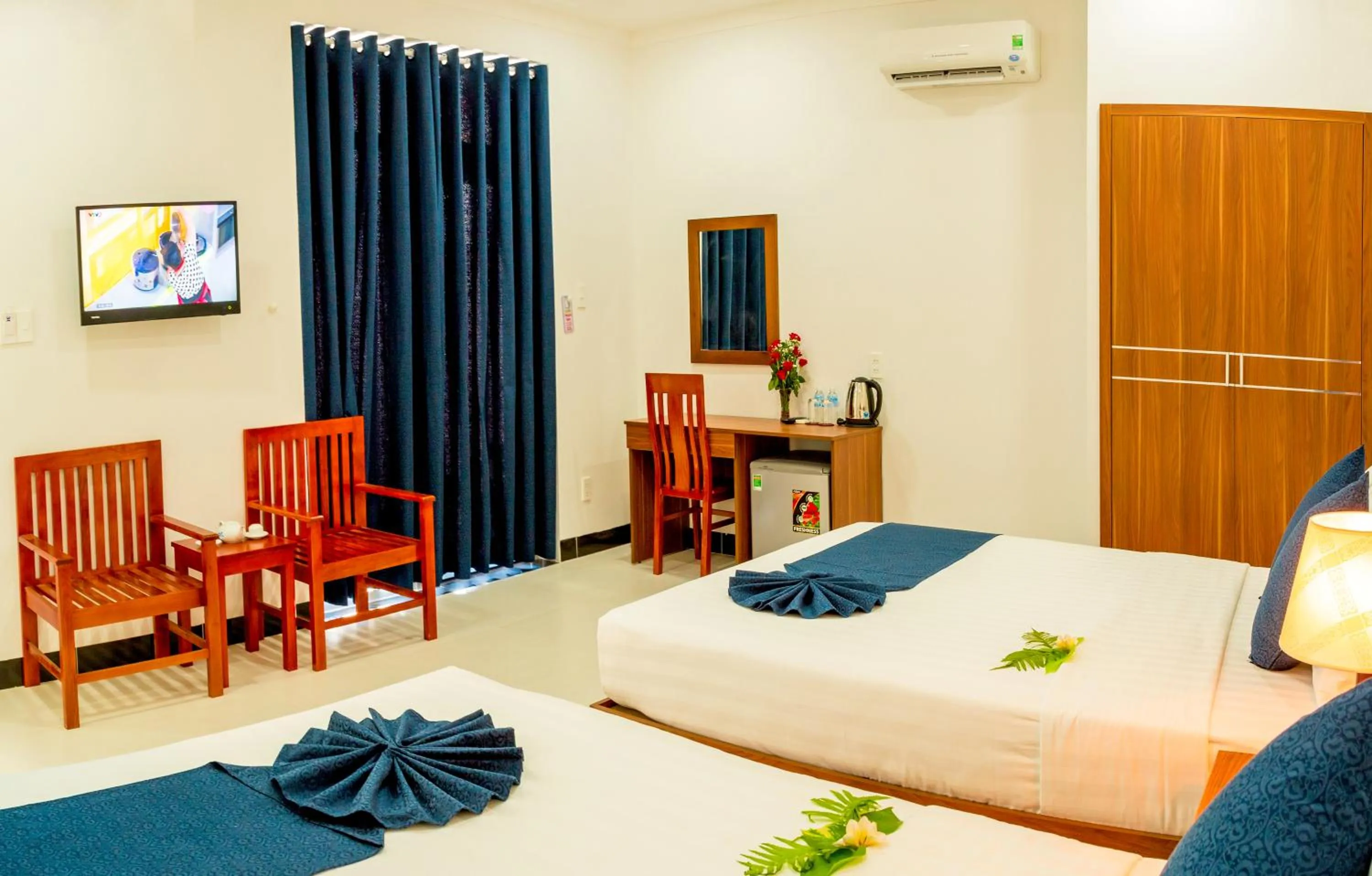 Bed in PHAM GIA HOTEL Mui Ne